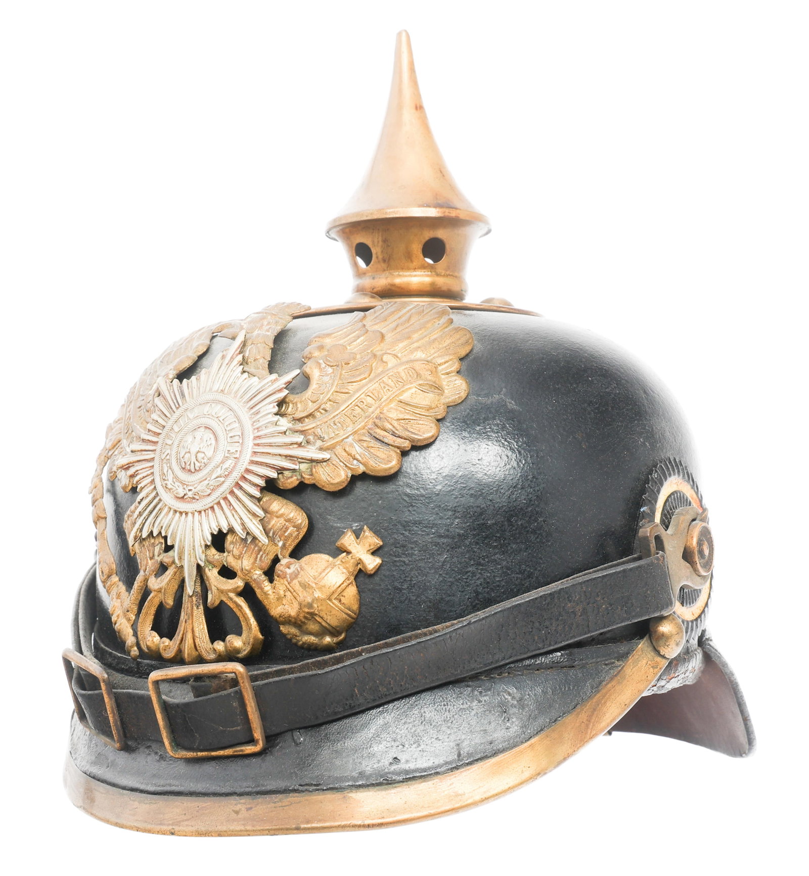 IMPERIAL GERMAN PRUSSIAN GARDE M1895 PICKELHAUBE: IMPERIAL GERMAN PRUSSIAN GARDE M1895 PICKELHAUBE Imperial German Prussian Garde Infantry M1895 Pickelhaube. Black leather hard shell with brass visor trim, rear spine and fixed spike. Brass and silver