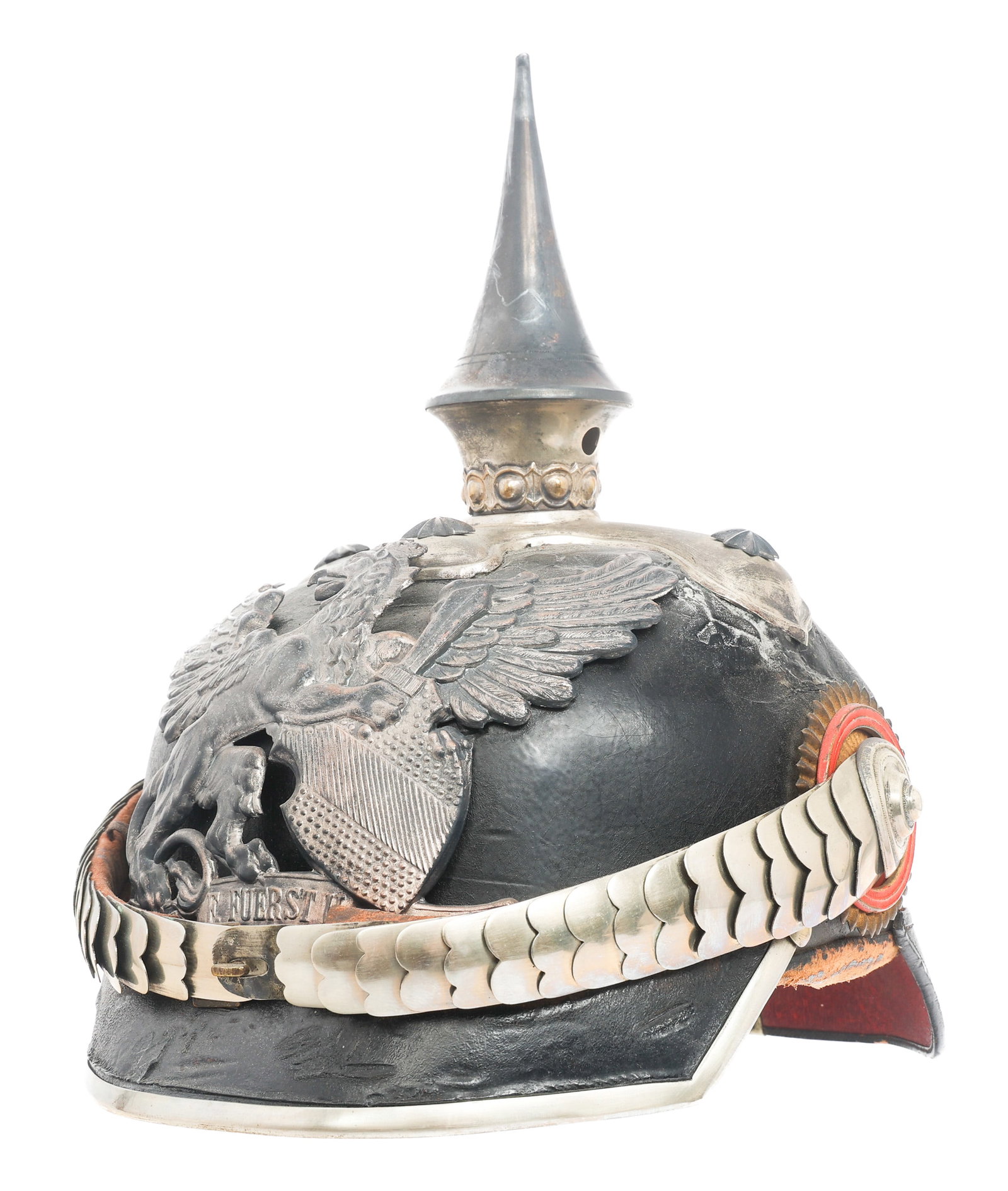 IMPERIAL GERMAN BADEN DRAGOON OFFICER PICKELHAUBE: IMPERIAL GERMAN BADEN DRAGOON OFFICER PICKELHAUBE Imperial German Baden Dragoon Officer Pickelhaube. Black leather hard shell with silver visor trim, rear spine, fixed spike and cruciform base. Square