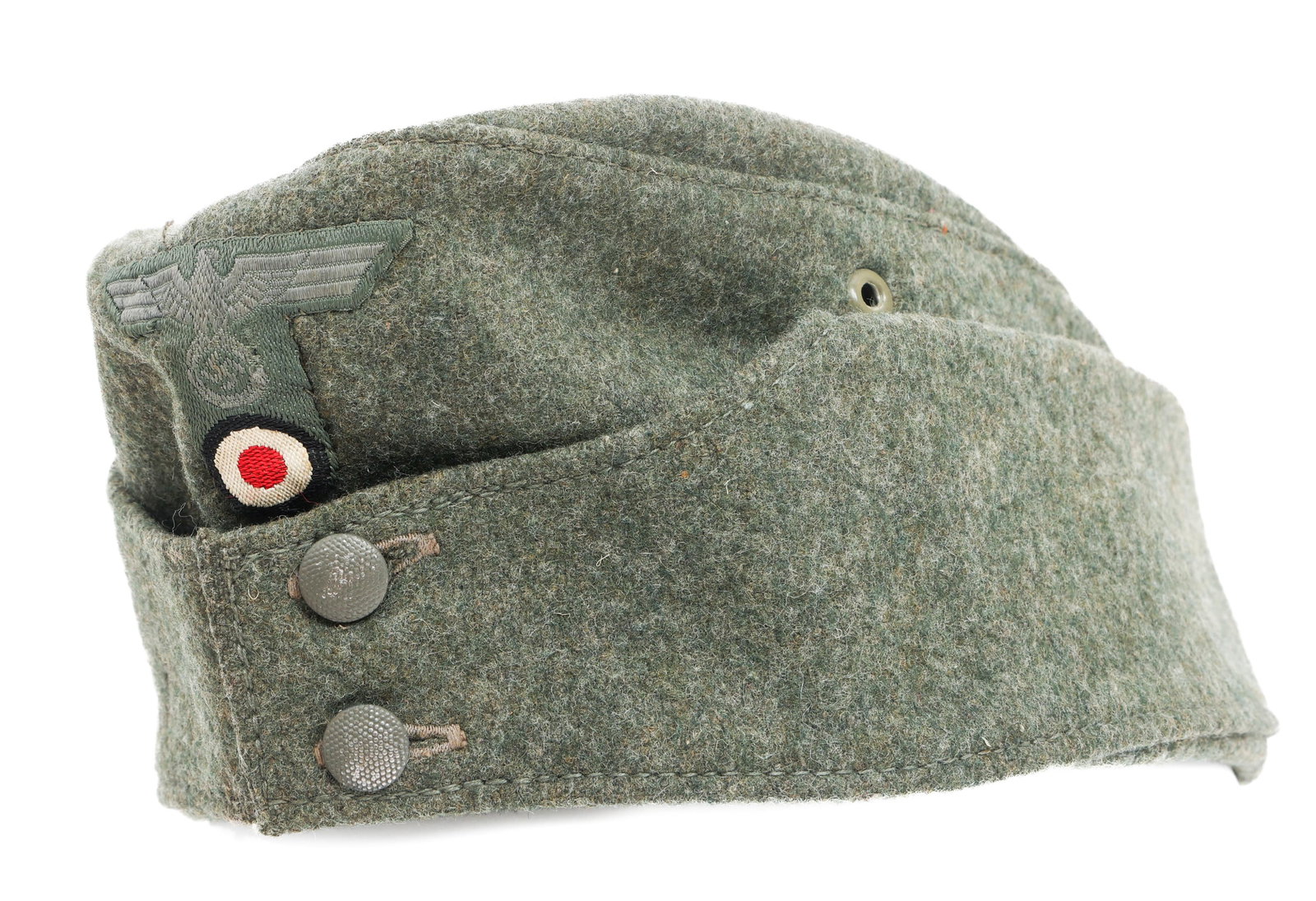 WWII GERMAN HEER M42 EM/NCO OVERSEAS CAP: WWII GERMAN HEER M42 EM/NCO OVERSEAS CAP WWII German Heer M42 EM/NCO Overseas Cap. Feldgrau wool with frontal Heer Eagle and cockade patch. Pebbled buttons. Maker mark ink stamp of Karl Naubart on the