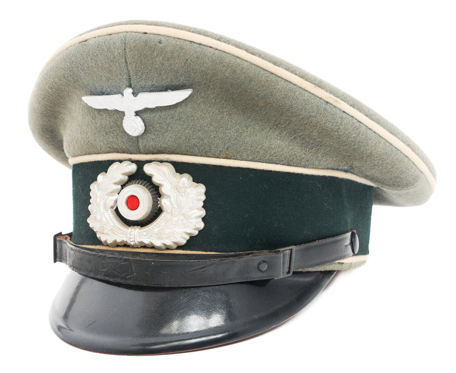 WWII GERMAN HEER INFANTRY NCO VISOR CAP: WWII GERMAN HEER INFANTRY NCO VISOR CAP WWII German Heer Infantry NCO Visor Cap. Feldgrau wool with white felt waffenfarbe. Heer Eagle and wreathed aluminum cockade cap badges. Double buckle leather c