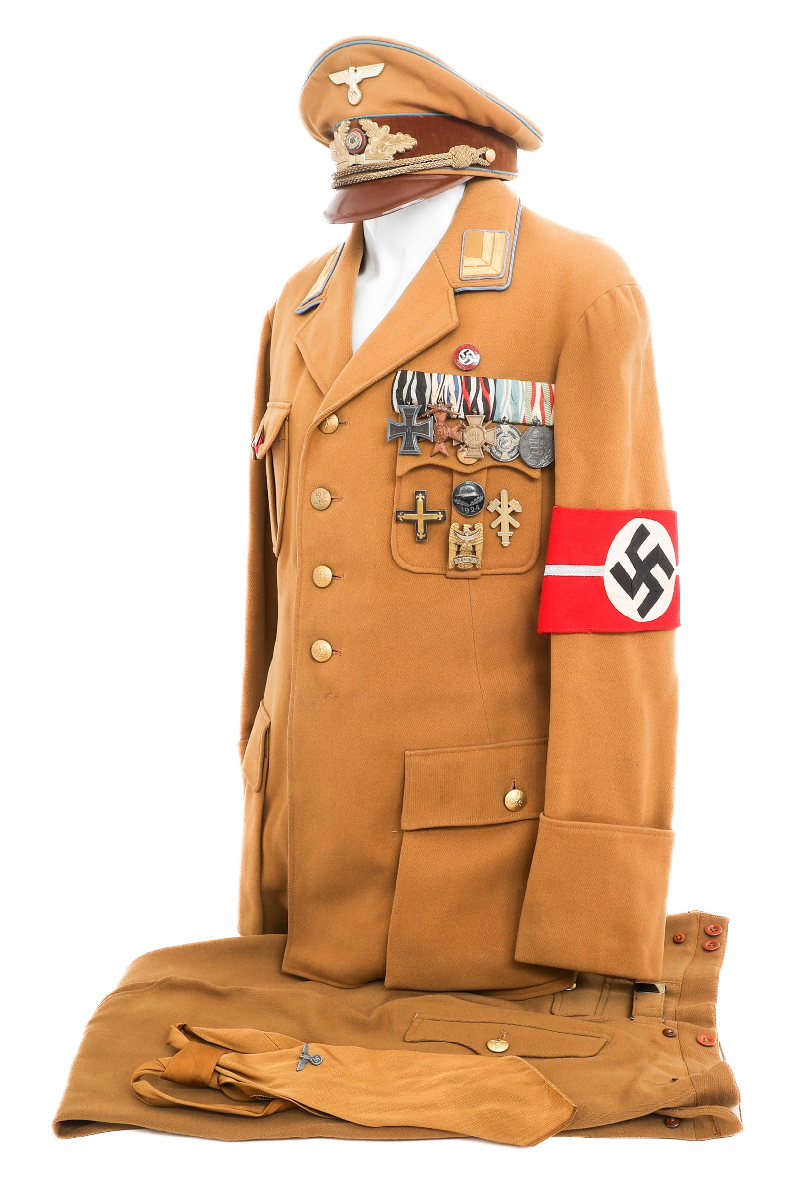WWII GERMAN NSDAP ORTSGRUPPE STELLENLEITER UNIFORM: WWII GERMAN NSDAP ORTSGRUPPE STELLENLEITER UNIFORM WWII German NSDAP Ortsgruppe Hauptstellenleiter Uniform set. (1) Standard four pocket, fine quality wool gabardine tunic with blue piping and Hauptst
