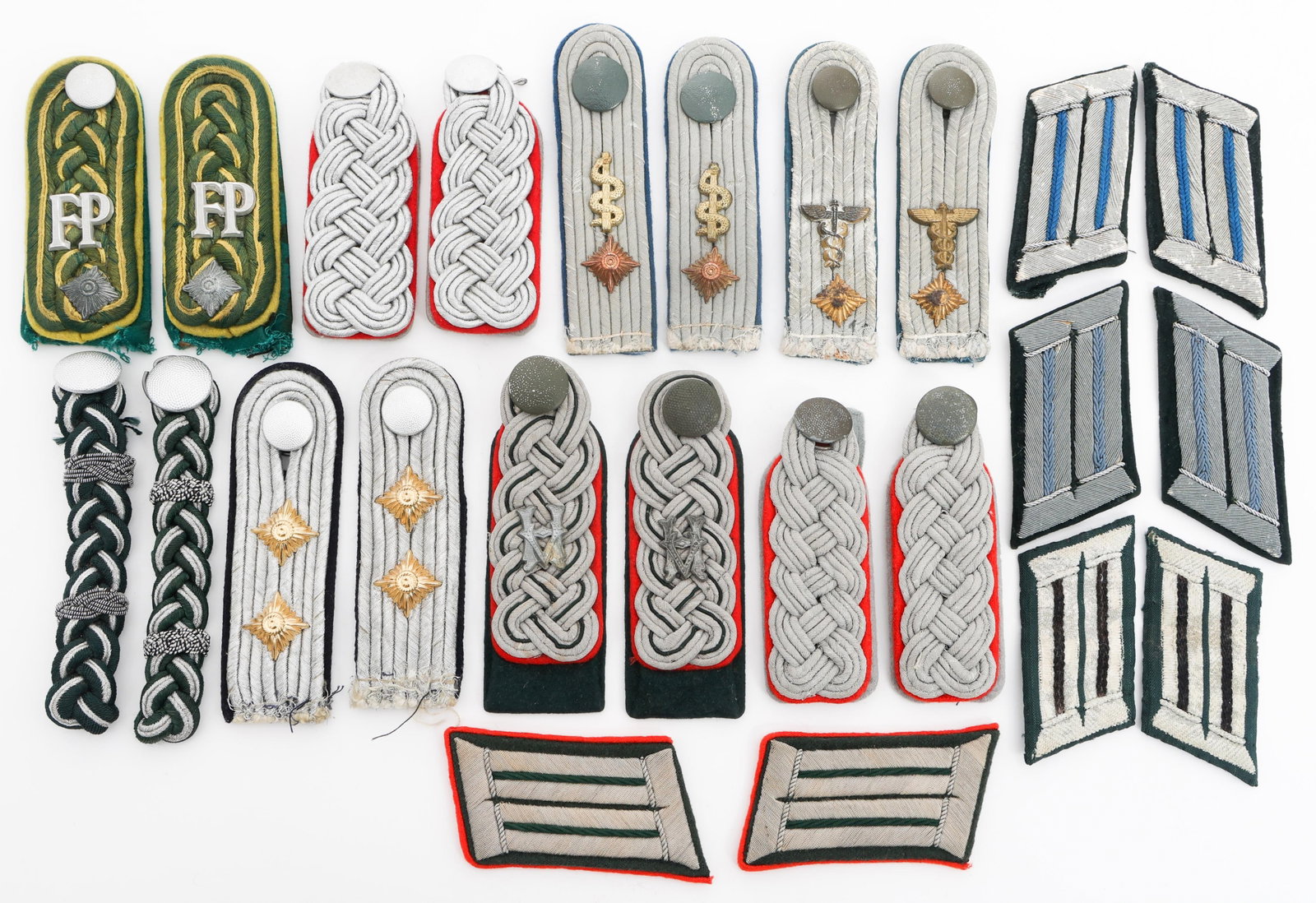 WWII GERMAN HEER OFFICER SHOULDER & COLLAR TABS: WWII GERMAN HEER OFFICER SHOULDER & COLLAR TABS WWII German Officials, Army, and Medical Officer Shoulder Boards and Collar Tabs. (7) Pairs of WWII German Officer Shoulder Boards. Ranks and services i