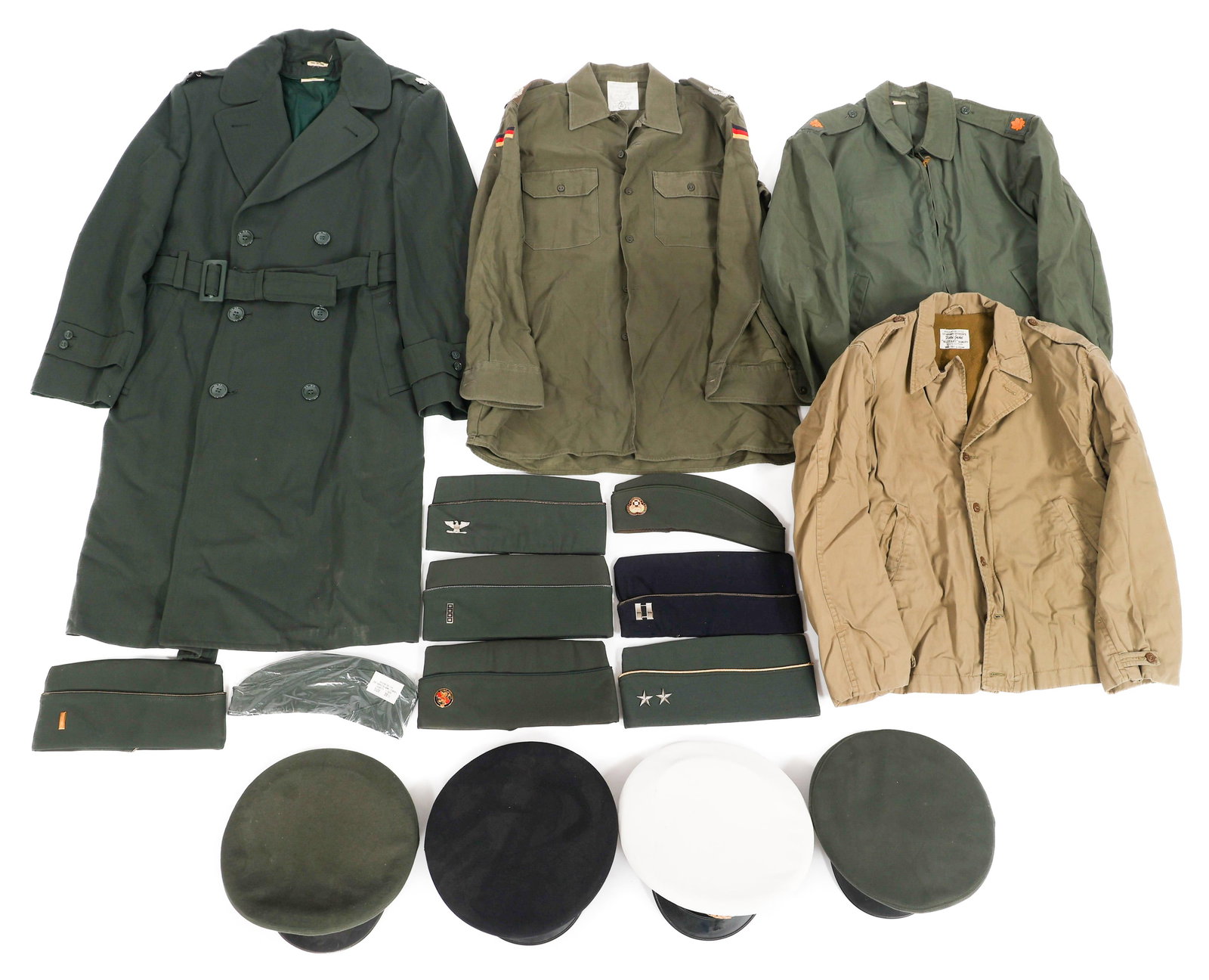 COLD WAR - CURRENT US & GERMAN UNIFORMS & CAPS: COLD WAR - CURRENT US & GERMAN UNIFORMS & CAPS Cold War - Current US and German Uniform Jackets, Shirts, Visor and Garrison Caps. (4) Jackets, including West German Obersts Field Shirt, US Major Jacke