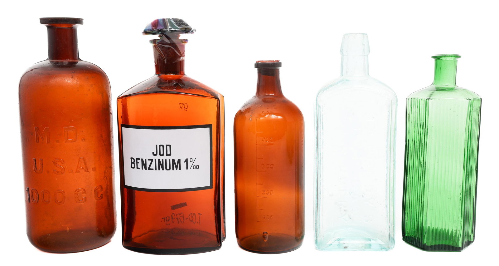 19th - 20th C. US MEDICINE GLASS BOTTLES: 19th - 20th C. US MEDICINE GLASS BOTTLES 19th - 20th Century US Medicine Glass Bottles. Markings and makers include Donald Kennedy Co. Kennedy's Medical Discovery and M.D. U.S.A. Size: 8" x 3" - 9" x 