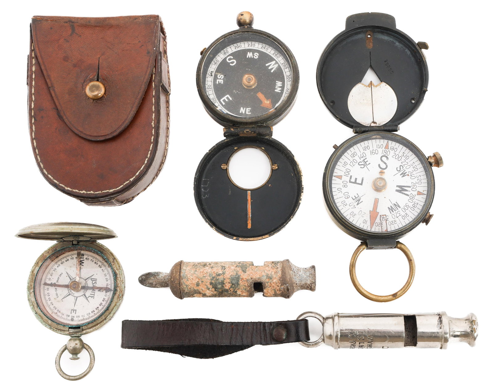 WWI US & BRITISH ARMY TRENCH WHISTLES & COMPASSES: WWI US & BRITISH ARMY TRENCH WHISTLES & COMPASSES WWI U.S. and British Army Trench Whistles and Compasses. Includes (2) Trench Whistles. One is a dug relic. The other is maker marked by A. DeCourcy an