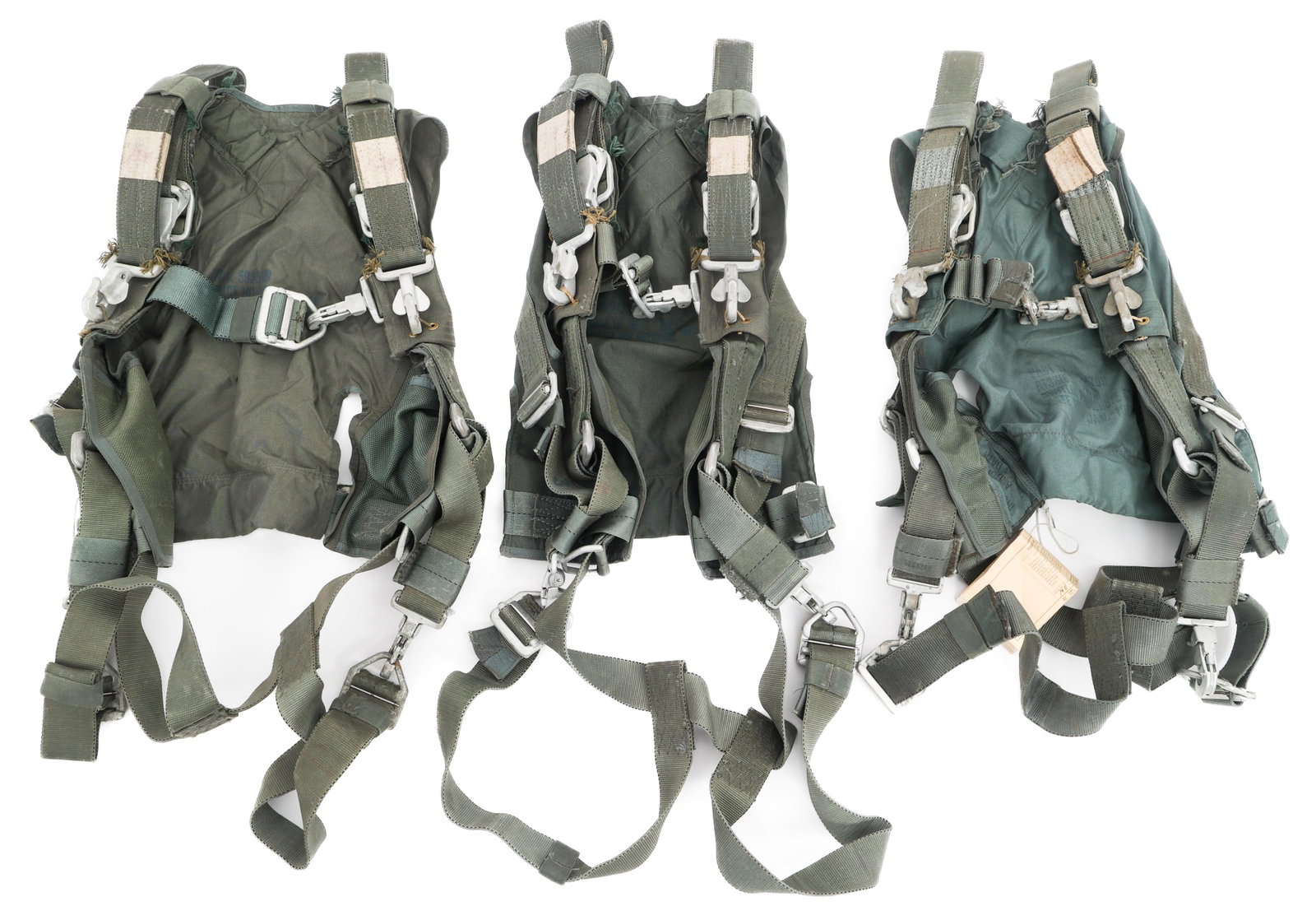 VIETNAM WAR USAF PILOT PARACHUTE HARNESSES: VIETNAM WAR USAF PILOT PARACHUTE HARNESSES Vietnam War to Post War Era, US Air Force Pilot Parachute Harnesses. Maker marked by Reliance and Switlik. Dated 1961 and 1982.
