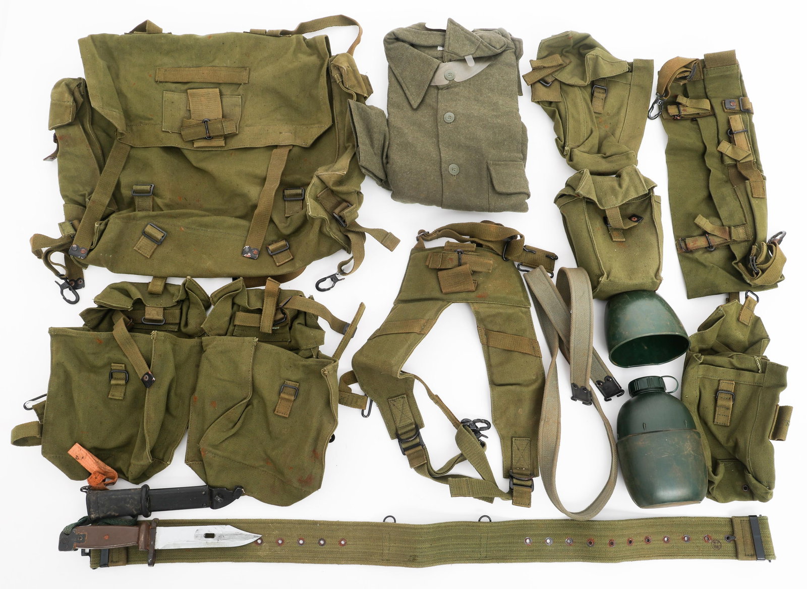 IRAQI P58 COMBAT FIELD GEAR & BAYONET: IRAQI P58 COMBAT FIELD GEAR & BAYONET Iraqi P58 Combat Field Gear, Bayonet. (1) Wool Jacket with Jihm marked Ministry of Defense Iraqi Armed Forces tag. Size 17 1/2. (1) Field Bag. (1) Double Cell Mag