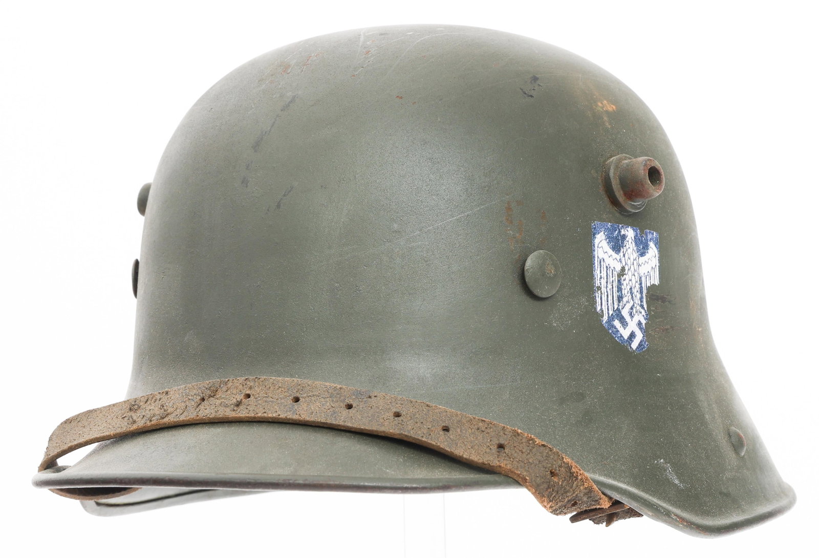 REFURBISHED GERMAN M17 DOUBLE DECAL COMBAT HELMET: REFURBISHED GERMAN M17 DOUBLE DECAL COMBAT HELMET Refurbished German M17 Combat Helmet. Post war repainted outer shell with hand painted WWII German decals. No visible maker mark. Steel band with repl