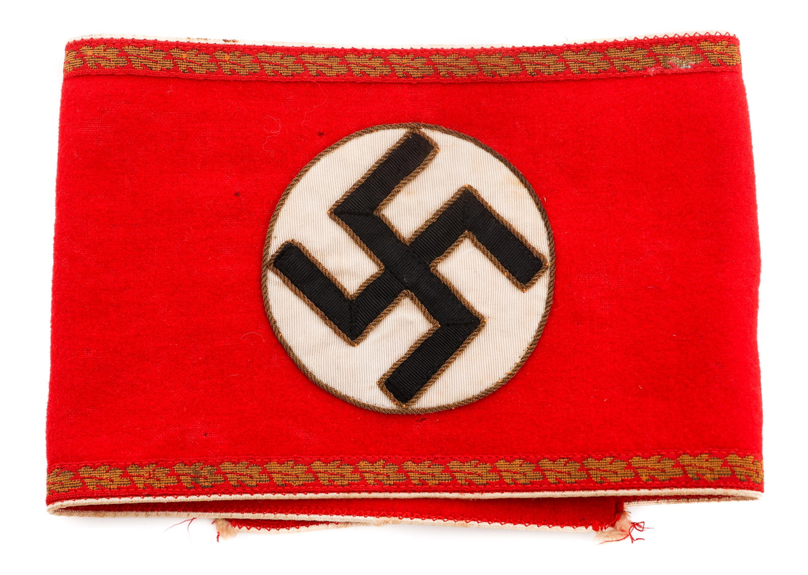 WWII GERMAN NSDAP LEITER EINER STELLE ARMBAND: WWII GERMAN NSDAP LEITER EINER STELLE ARMBAND WWII German NSDAP Kreis Level Leiter Einer Stelle Armband. Red wool / felt fabric with white piping. Central white rayon disc overlaid by a multi-piece bl