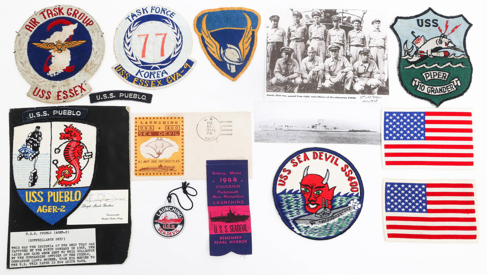 COLD WAR USS PUEBLO & NAVY SHIPS UNIT PATCHES: COLD WAR USS PUEBLO & NAVY SHIPS UNIT PATCHES Cold War US Navy Ships Unit Patches. Includes WWII US Navy Submarine USS Sea Devil, SS400, Patch with 1944 launch ceremony envelope, ribbon, and badge. WW