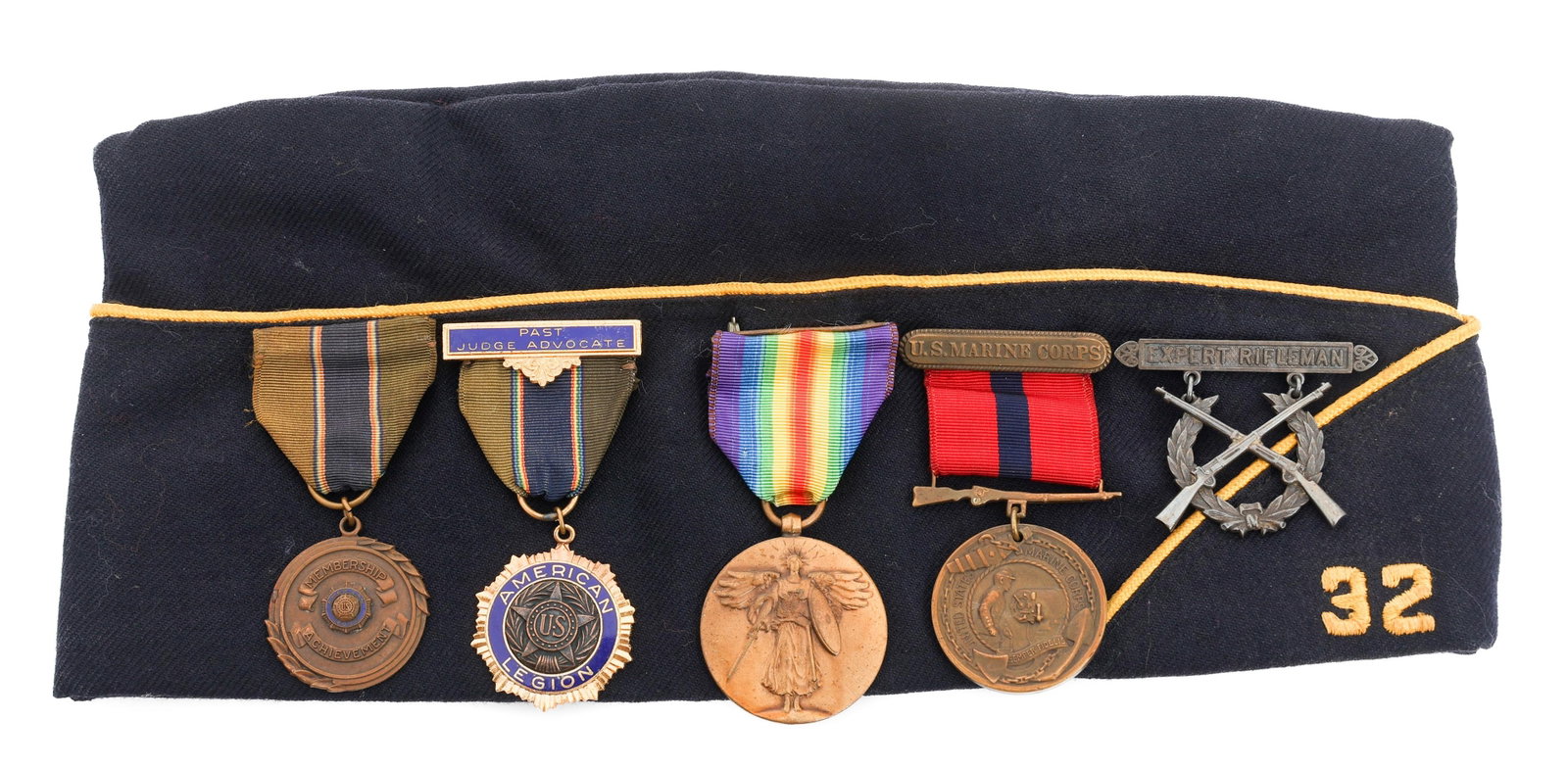 WWI USMC NAMED GOOD CONDUCT MEDAL & GARRISON CAP: WWI USMC NAMED GOOD CONDUCT MEDAL & GARRISON CAP WWI USMC Good Conduct Medal and American Legion Garrison Cap. (1) Hialeah, FL American Legion Garrison Cap. Maker marked on the sweatband. Size: 7. (1)