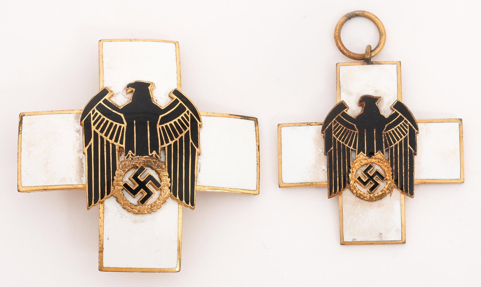 WWII GERMAN RED CROSS 1st & 2nd CLASS DECORATION: WWII GERMAN RED CROSS 1st & 2nd CLASS DECORATION WWII German Red Cross 1st and 2nd Class Decoration. (1) 1st Class Neck Cross Decoration. White and black enamel with suspension ring. Maker marked 21 o