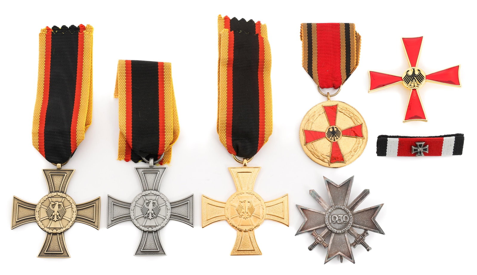 POST WAR GERMAN BUNDESWEHR AWARDS & MEDALS: POST WAR GERMAN BUNDESWEHR AWARDS & MEDALS Post War German Bundeswehr Awards and Medals. (3) Cross of Honor for Valor medals. Bronze, Silver and Gold Grade. Unmarked. (1) Bundeswehr 1939 War Merit Cro