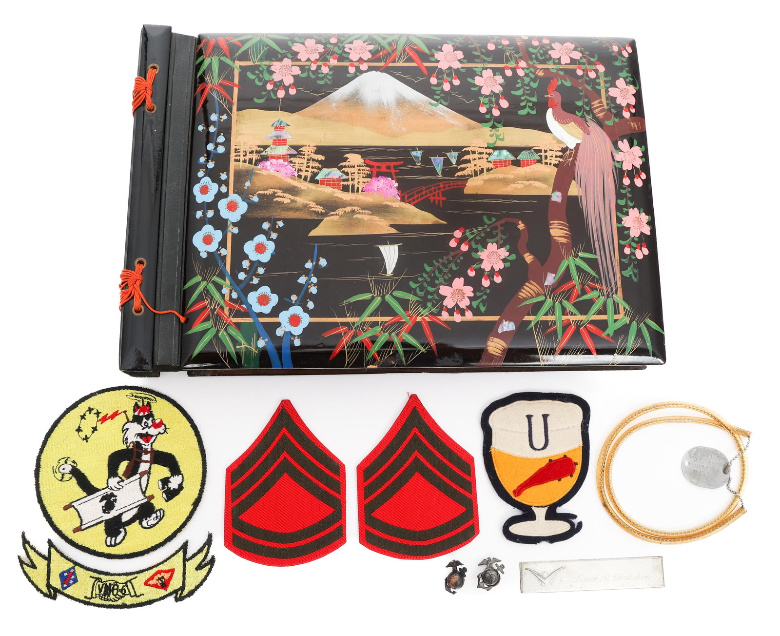 KOREA USMC PILOTS PHOTO, DOG TAG, & PATCH GROUPING: KOREA USMC PILOTS PHOTO, DOG TAG, & PATCH GROUPING Korean War USMC Pilots Photos, Dog Tags, and Patch Grouping. (1) Photo album, Japanese Made. Lacquered wood with inset mother of pearl. Photos depict