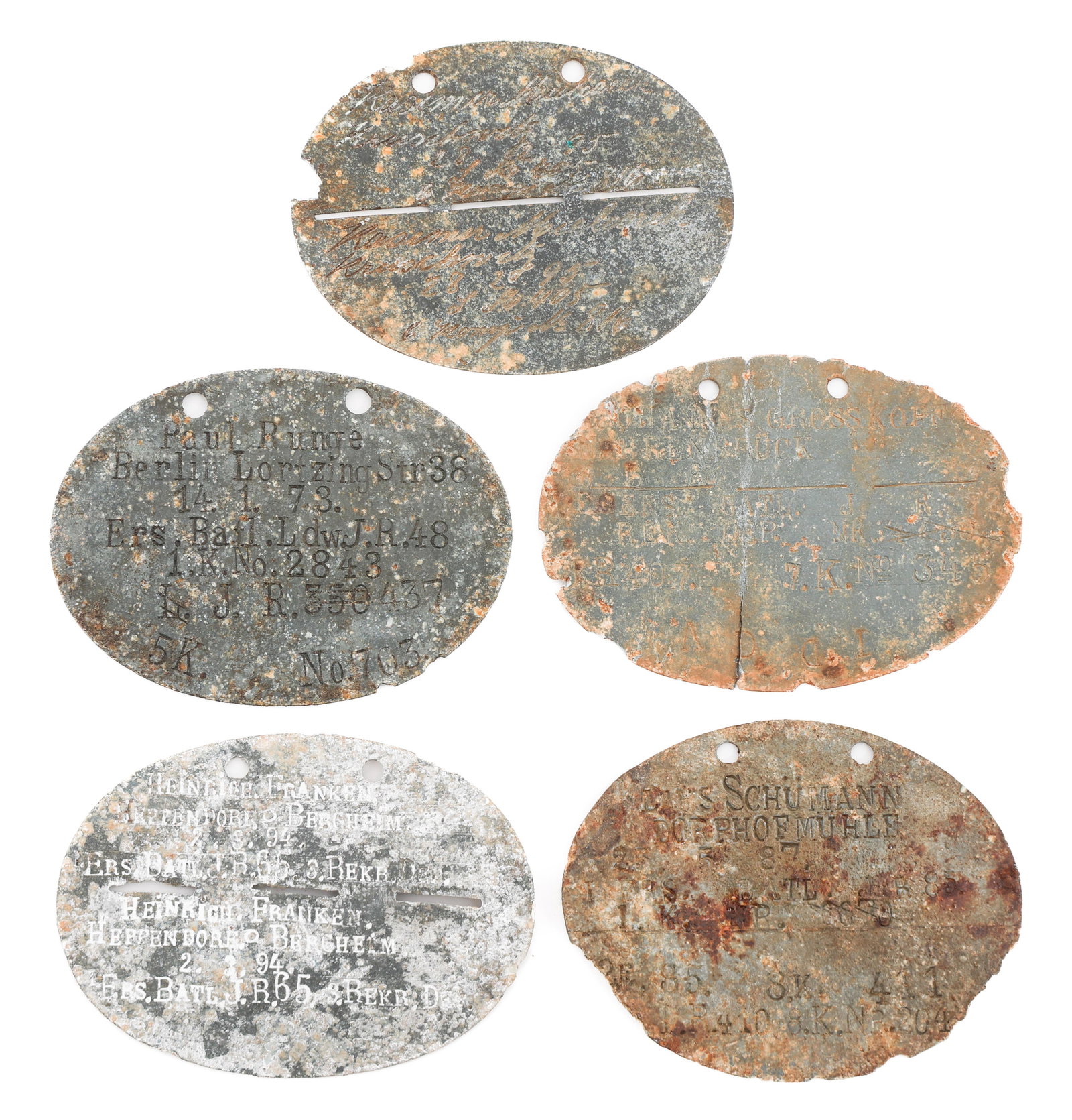 WWI GERMAN ARMY NAMED DOG TAGS: WWI GERMAN ARMY NAMED DOG TAGS WWI Germany Army Dog Tags. Named to Paul Runge, Johannes Grosskopf, Klaus Schumann, Heinrich Franken, and one illegible.