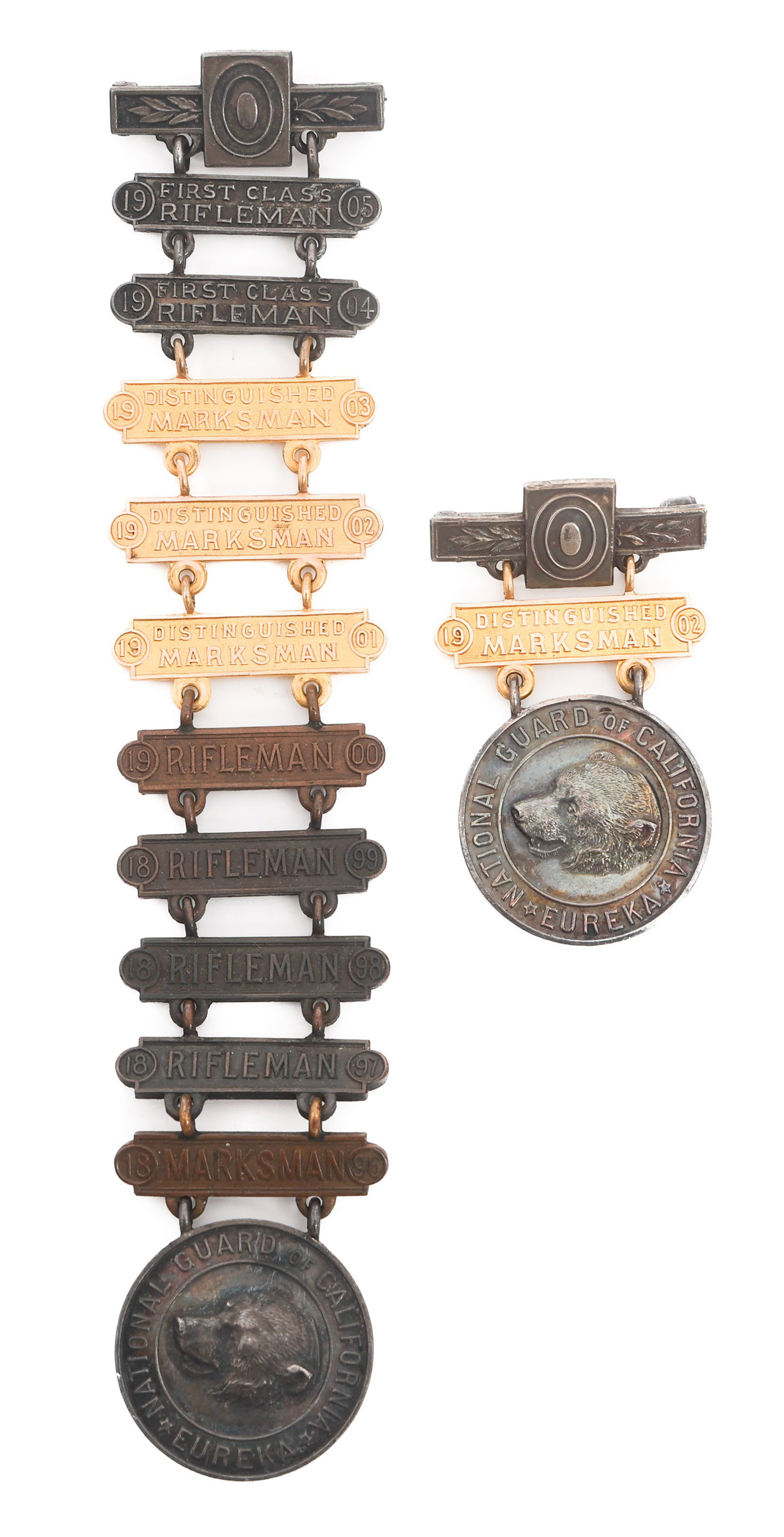 14K GOLD CALIFORNIA NG MARKSMANSHIP BADGE: 14K GOLD CALIFORNIA NG MARKSMANSHIP BADGE 14k Gold California National Guard Marksmanship Badges. (2) Marksmanship Badges. Serial numbered on the reverse. Four bars are 14k gold, three are marked Ster