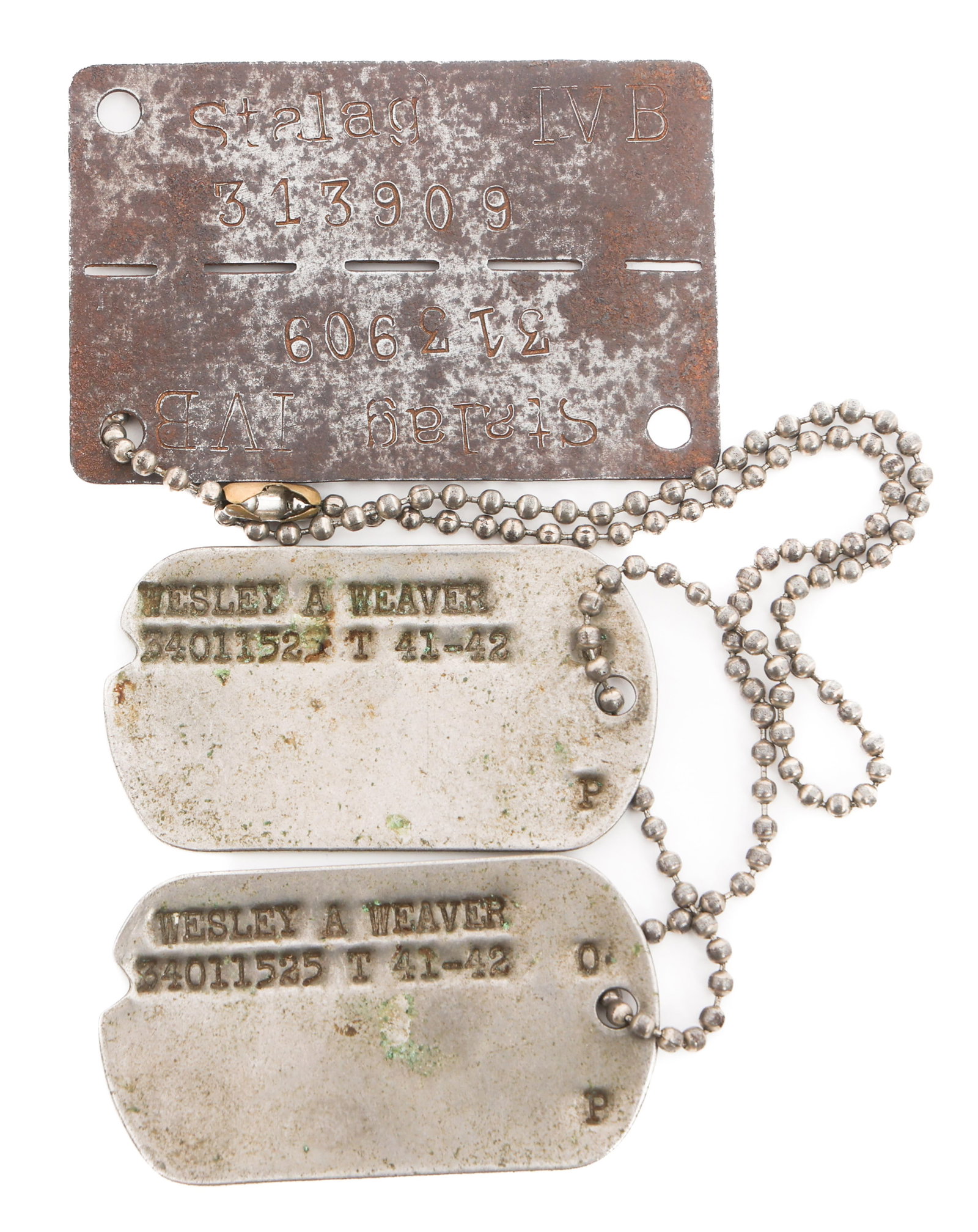 WWII US ARMY POW SOLDIER STALAG LUFT IV-B DOGTAGS: WWII US ARMY POW SOLDIER STALAG LUFT IV-B DOGTAGS WWII U.S. Army POW Soldier Stalag Luft IV-B Dogtags. Named to Sargent Westley A. Weaver. 422nd Infantry, 106th Division. He was captured by the German