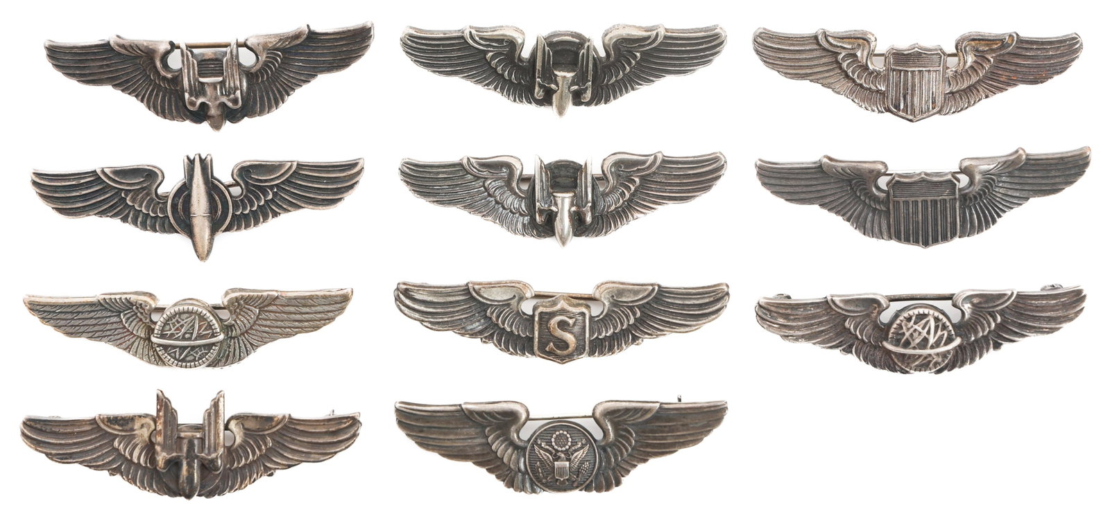 WWII US AAF 2" QUALIFICATION FLIGHT WINGS: WWII US AAF 2" QUALIFICATION FLIGHT WINGS WWII US Army Air Force 2" Qualification Flight Wings. Ranks includes Bombardier, Aerial Gunner, Navigator, Service Pilot, Aircrew member, and more. Most marke