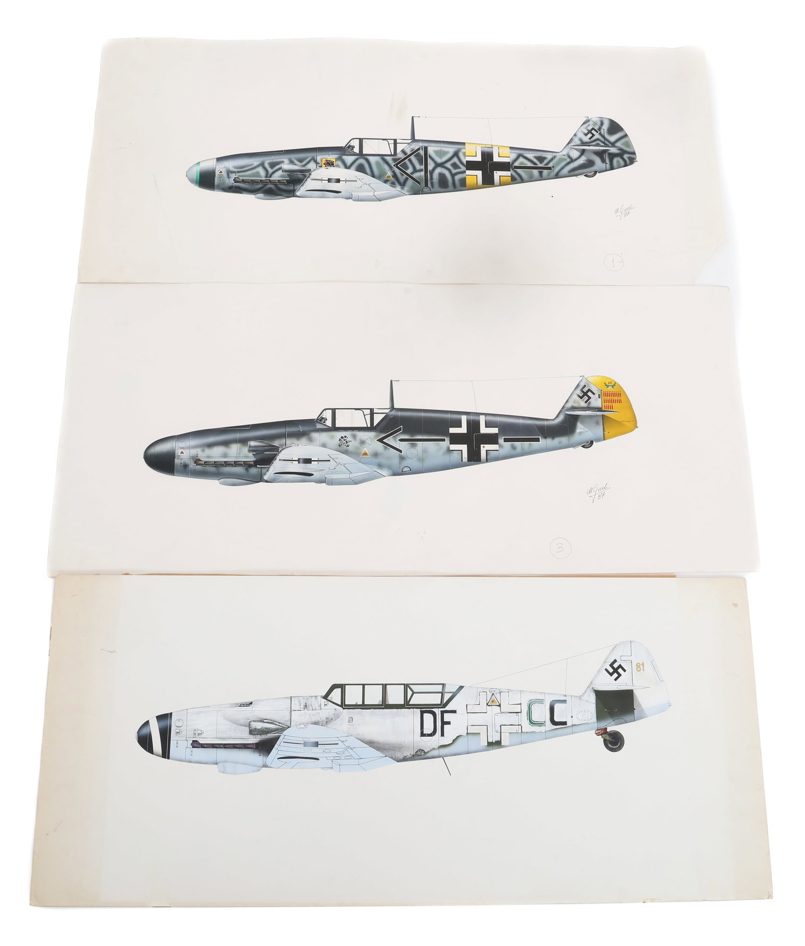 MESSERSCHMITT BF 109 & G12 PAINTINGS - W. GUELLI: MESSERSCHMITT BF 109 & G12 PAINTINGS - W. GUELLI WWII German Messerschmitt BF 109 and 109 G12 Paintings by W. Guelli. Gouache and pencil on paper. Two are hand signed by Guelli and dated 1987. Size: 1