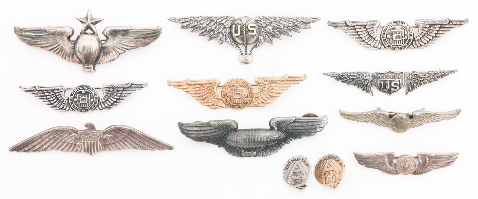 WWI - WWII CAA, BALLOON & PILOT RESTRIKE WINGS: WWI - WWII CAA, BALLOON & PILOT RESTRIKE WINGS Restrike of WWI - WWII Civil Aeronautics Administration Training Service, Balloon Service, Manhattan Bomb Project A Pins, Instructor Silver Wings, and