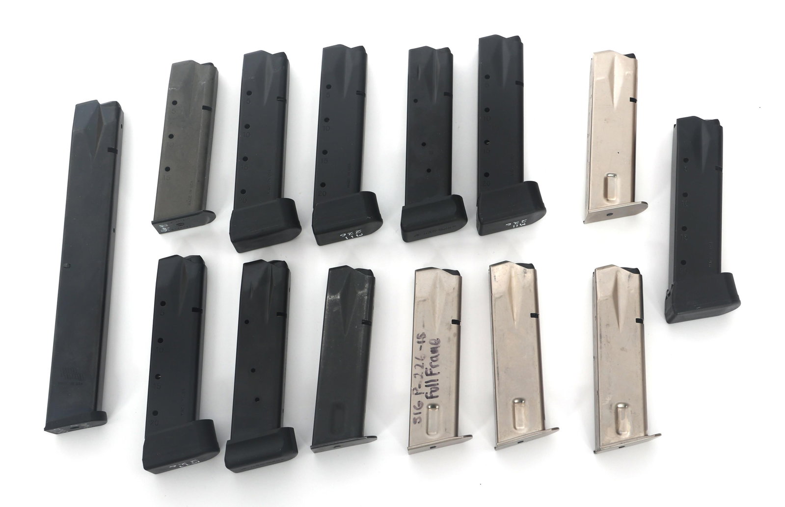 MAGAZINES FOR SIG P226 9mm & .357 CALIBER PISTOLS: MAGAZINES FOR SIG P226 9mm & .357 CALIBER PISTOLS Magazines for Sig P226 9mm caliber pistols. (12) 9mm (2) .357 Sig. Twelve Sig brand. One Promag brand. One unmarked. Size / Gauge: Varied