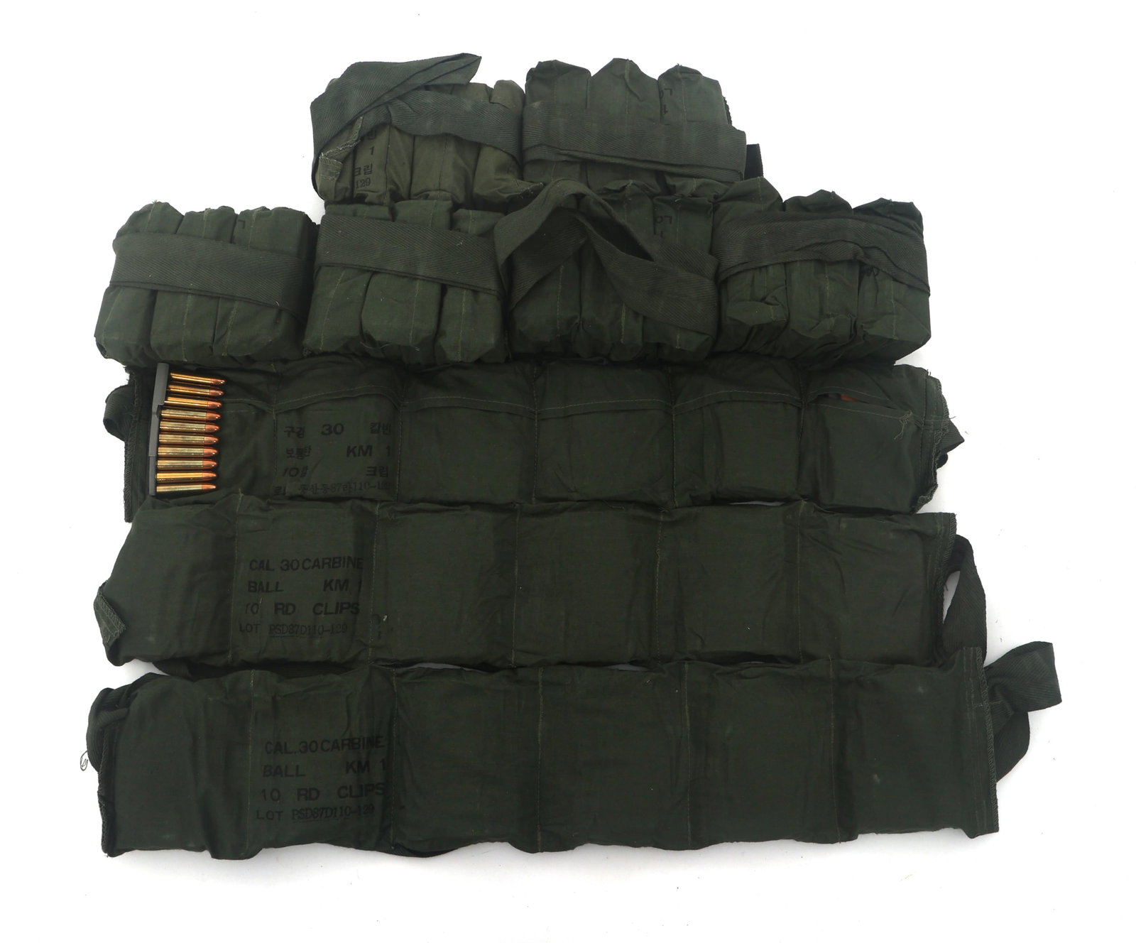 30 CARBINE CALIBER RIFLE AMMUNITION - 1000 ROUNDS: 30 CARBINE CALIBER RIFLE AMMUNITION - 1000 ROUNDS 1000 Rounds of .30 Carbine caliber rifle ammunition on stripper clips in bandoleers. Caliber / Gauge: 30 Carbine Weight: 41 Pounds