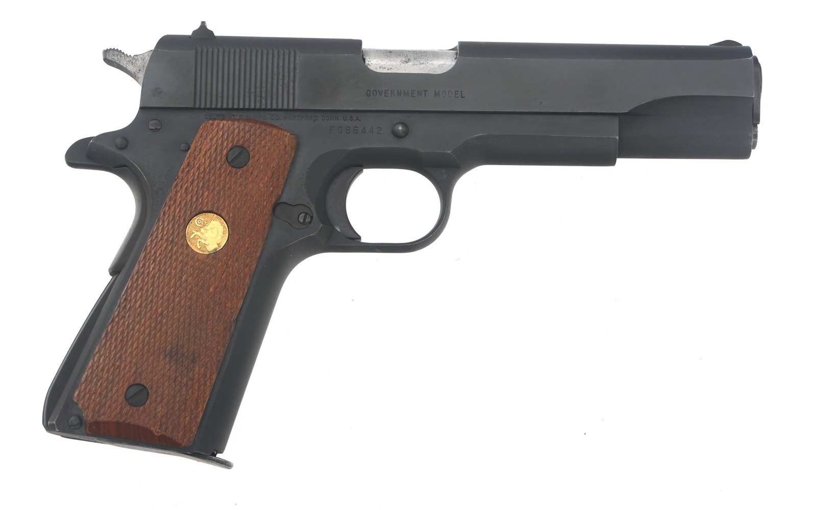 COLT Mk IV SERIES 80 GOVERNMENT MODEL PISTOL: COLT Mk IV SERIES 80 GOVERNMENT MODEL PISTOL 1989 Colt Mk 4 Series 80 Government Model .45 ACP caliber semi automatic pistol. Blued finish. Fixed sights. Checkered wood grips with Colt medallion. One 