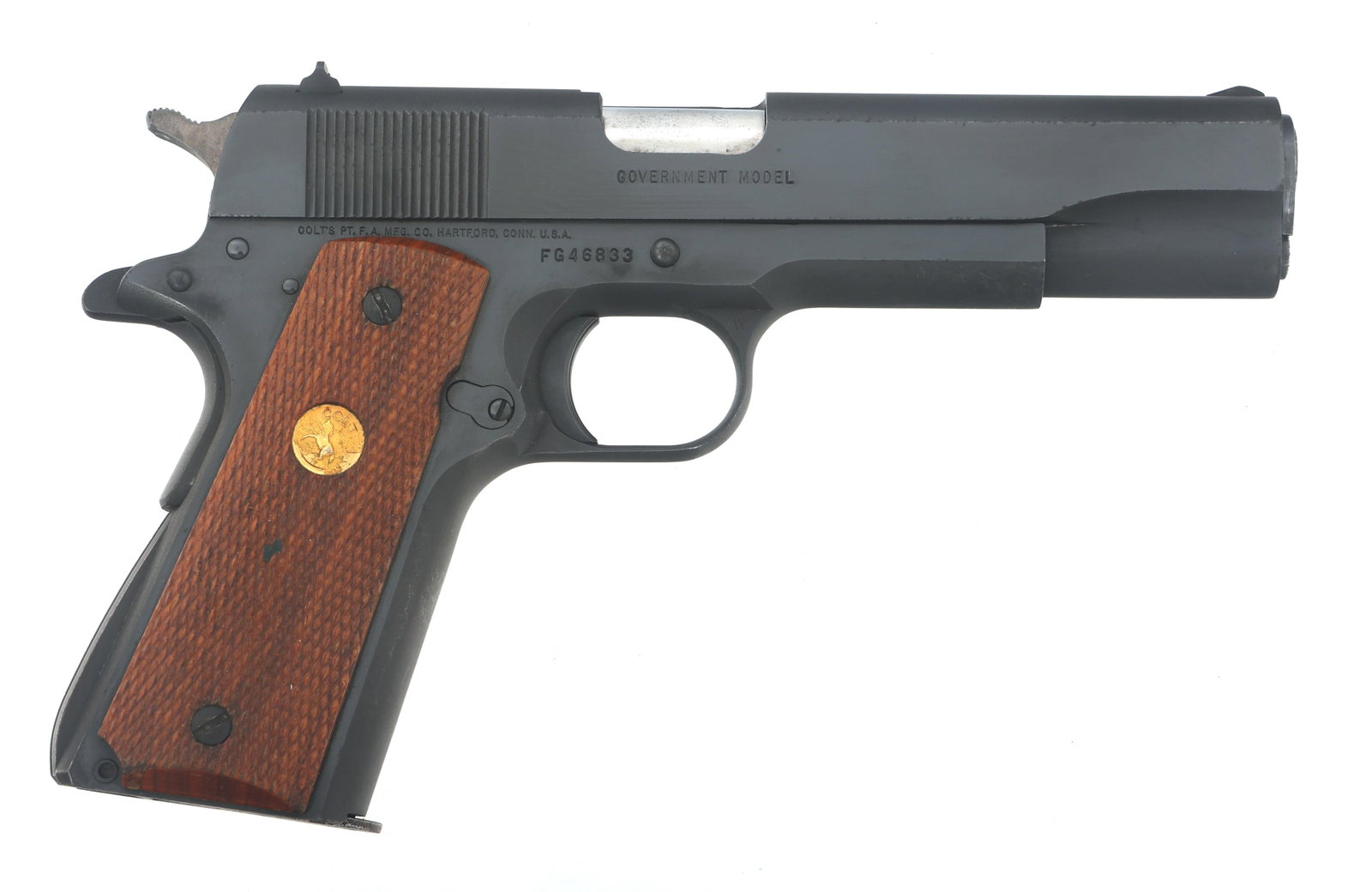COLT GOVERNMENT MODEL .45 AUTO CALIBER PISTOL: COLT GOVERNMENT MODEL .45 AUTO CALIBER PISTOL Colt Government Model 80 Series Mark IV .45 Auto caliber semi-automatic pistol. Blued finish. Checkered wood grips with Colt medallions. One magazine. Cal