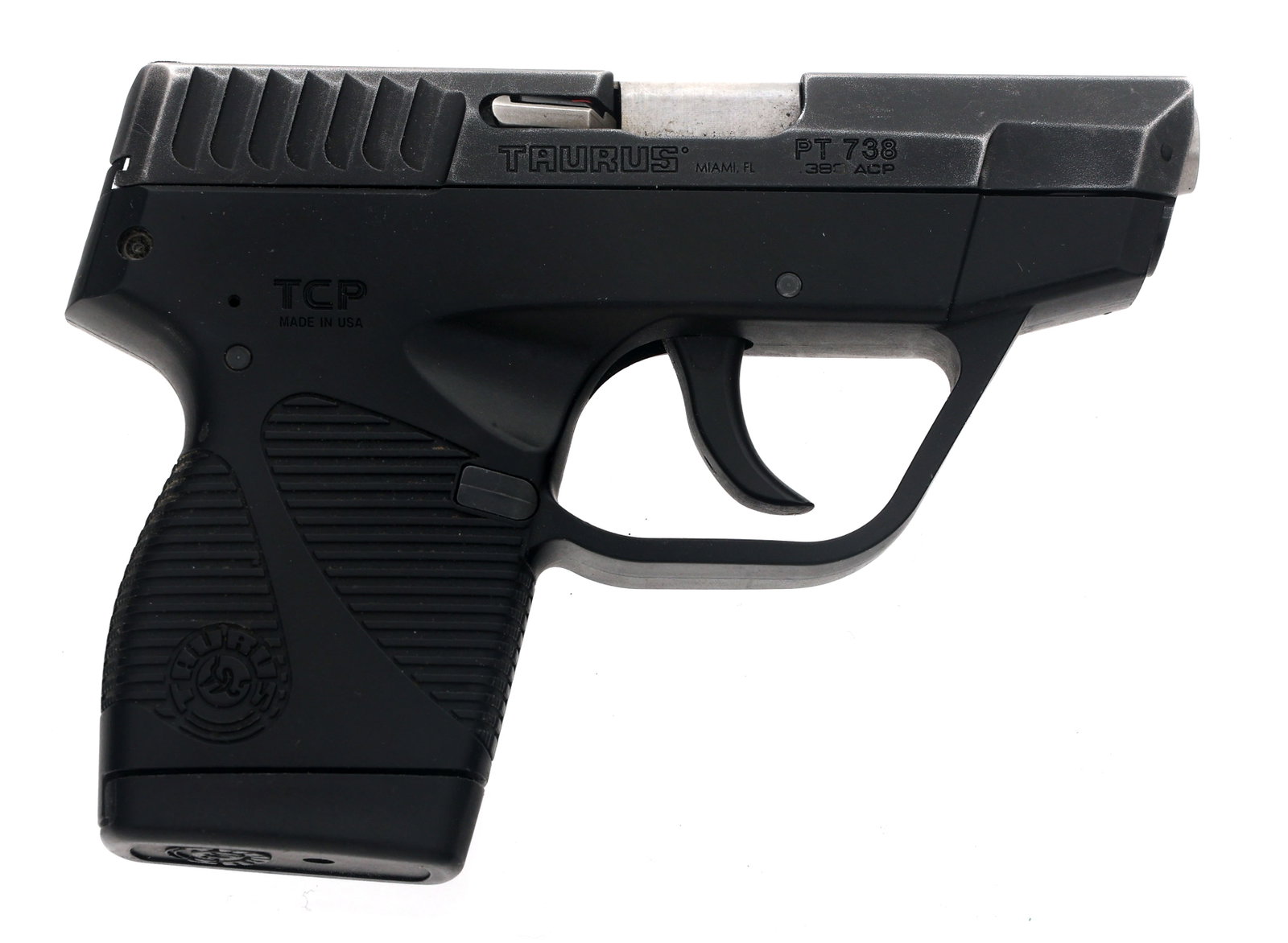 TAURUS TCP MODEL PT 738 .380 ACP CALIBER PISTOL: TAURUS TCP MODEL PT 738 .380 ACP CALIBER PISTOL Taurus Model TCP 738 .380 ACP caliber semi automatic pistol. Fixed sights. Polymer frame with textured grips. Three magazines. Owners manual. Cardboard 