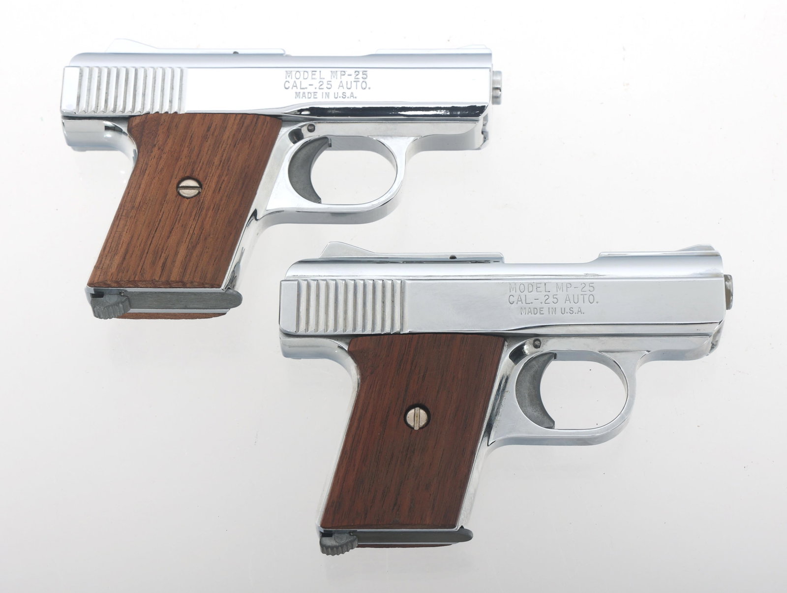 RAVEN ARMS MP-25 .25 CALIBER SEMI AUTO PISTOLS: RAVEN ARMS MP-25 .25 CALIBER SEMI AUTO PISTOLS Two Raven Arms Model MP-25 .25 ACP caliber semi automatic pistols. Chrome finish. Fixed sights. Wood grips. One magazine each. Caliber / Gauge: 25 ACP Ba