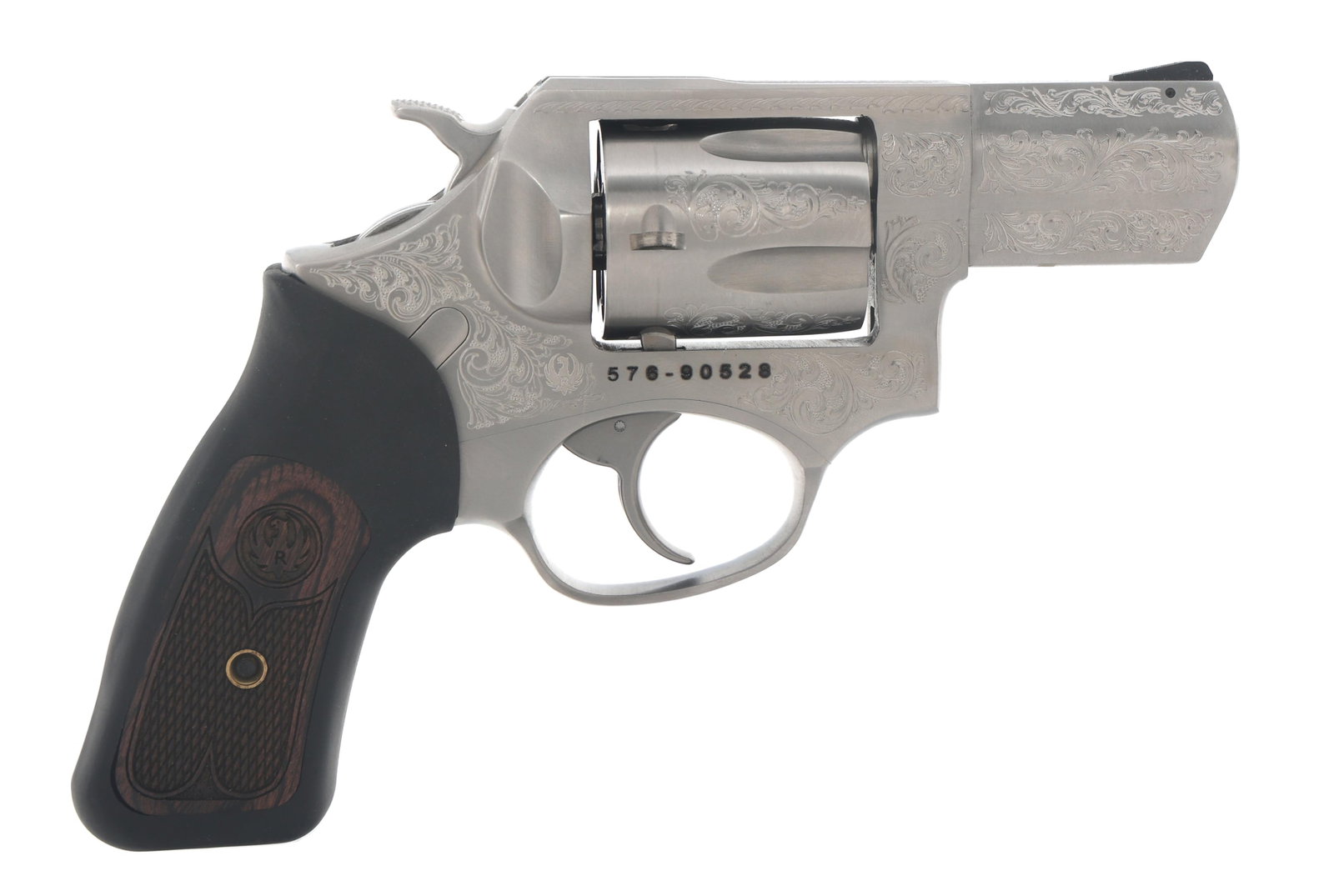 RUGER MODEL SP101 .357 MAGNUM CALIBER DA REVOLVER: RUGER MODEL SP101 .357 MAGNUM CALIBER DA REVOLVER Ruger Model SP101 .357 Magnum caliber double action revolver. Engraved barrel, frame and cylinder. Stainless steel finish. Rubber grip with hardwood i
