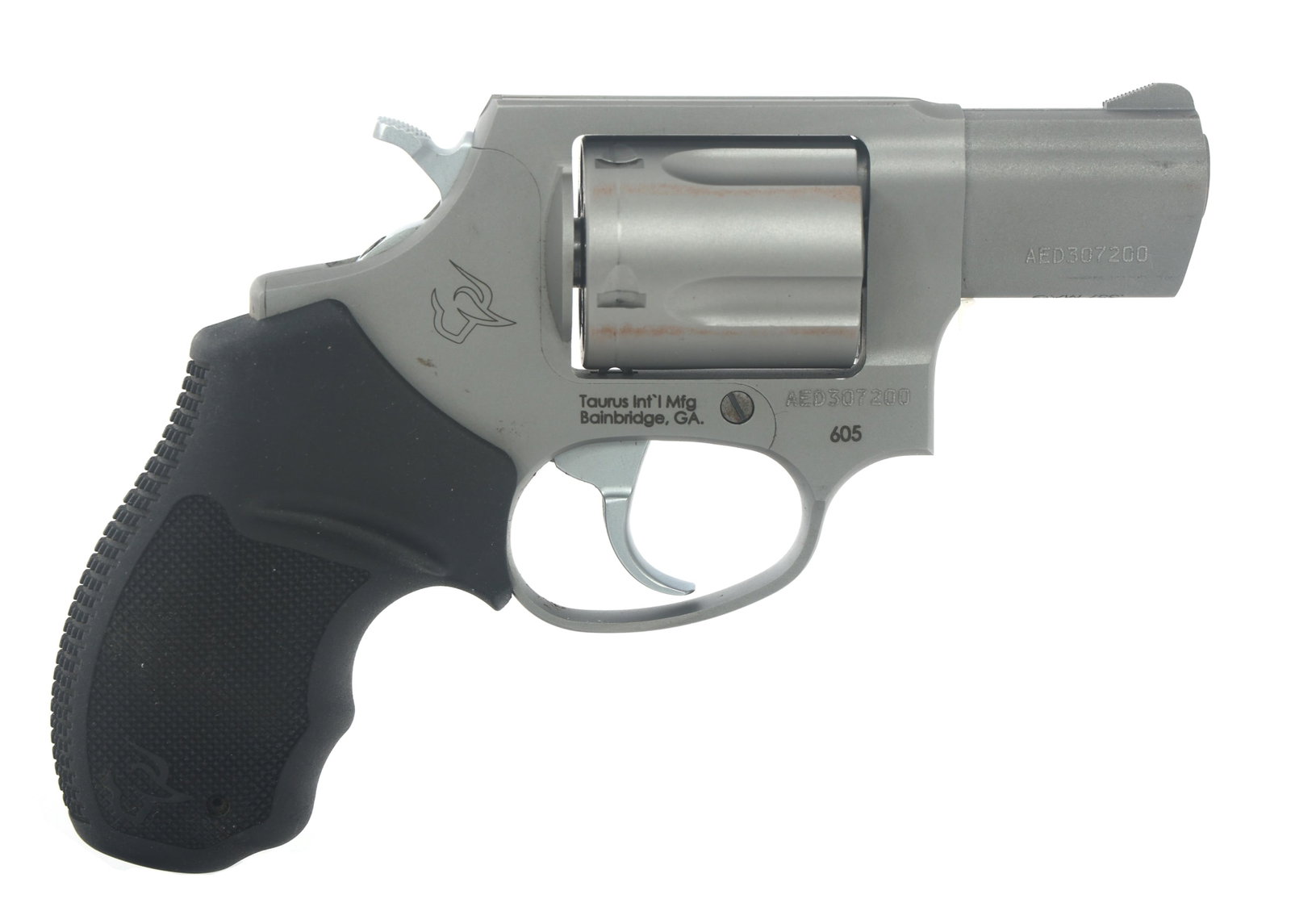 TAURUS MODEL 605 .357 MAG CALIBER DA REVOLVER: TAURUS MODEL 605 .357 MAG CALIBER DA REVOLVER Taurus Model 605 .357 Magnum caliber double action revolver. Import stamped Taurus. Matte stainless steel. Fixed sights. Checkered rubber Taurus grips. Fi