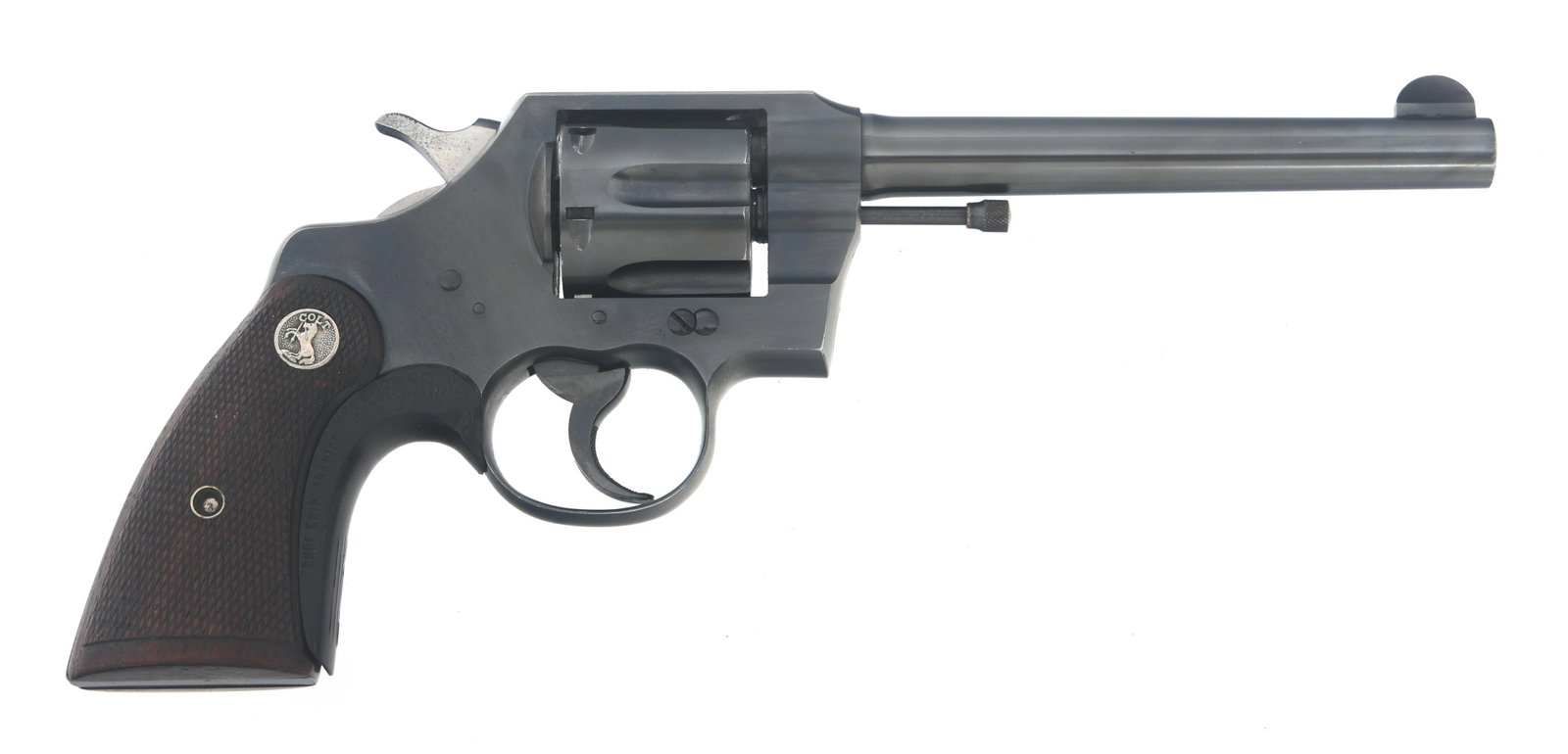 1930 COLT OFFICIAL POLICE .38 CALIBER DA REVOLVER: 1930 COLT OFFICIAL POLICE .38 CALIBER DA REVOLVER 1930 Colt Official Police .38 caliber double action revolver. Blued finish. Fixed sights. Checkered wood grips with Colt medallion. Six shot fluted cy