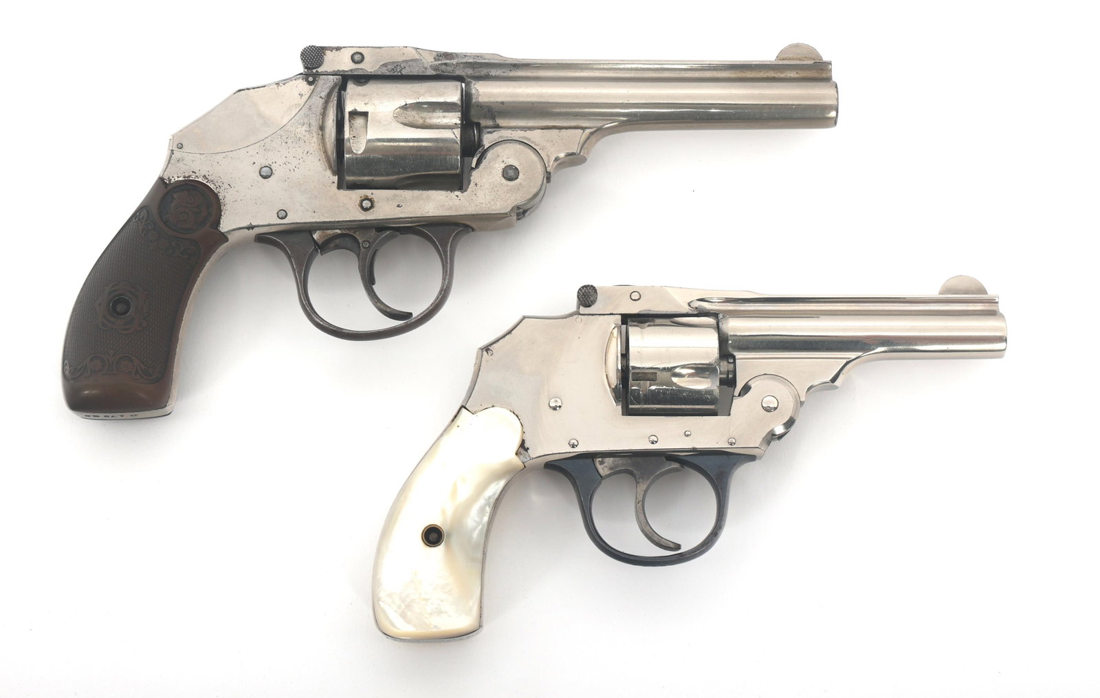 IVER JOHNSON SAFETY AUTOMATIC .32 & .38 REVOLVERS: IVER JOHNSON SAFETY AUTOMATIC .32 & .38 REVOLVERS Iver Johnson Safety Automatic .32 & .38 caliber revolvers. A) Iver Johnson Safety Automatic .32 caliber double action revolver. Mother of pearl