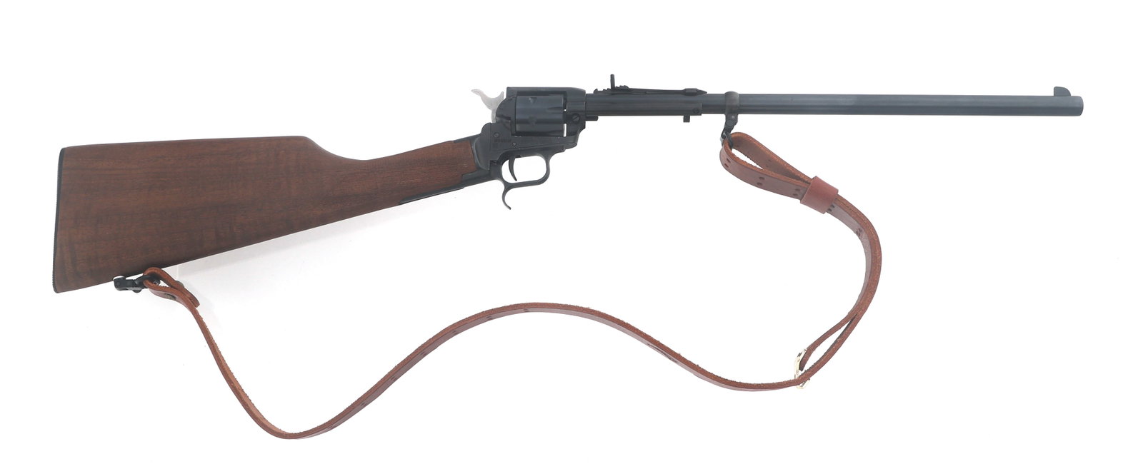 HERITAGE ROUGH RIDER .22 LR REVOLVER CARBINE: HERITAGE ROUGH RIDER .22 LR REVOLVER CARBINE Heritage Rough Rider 22 caliber revolving carbine. Blued finish. Adjustable rear sight. Leather sling. Checkered wood stock with composite butt plate. Six 