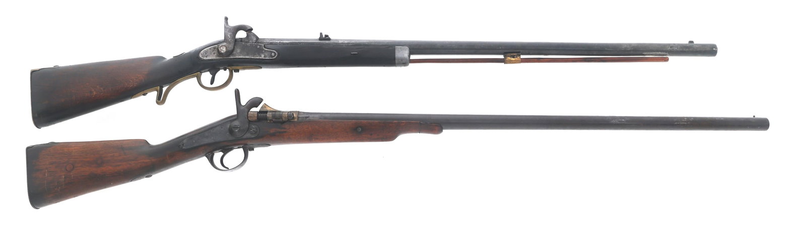 BELGIAN CONVERSION ZULU & FOWLER SHOTGUNS: BELGIAN CONVERSION ZULU & FOWLER SHOTGUNS Belgian Conversion Zulu and Percussion conversion Fowler shotguns. A) Belgium proof marks on brass breech cover. Serial number stamped inside of breech cover.