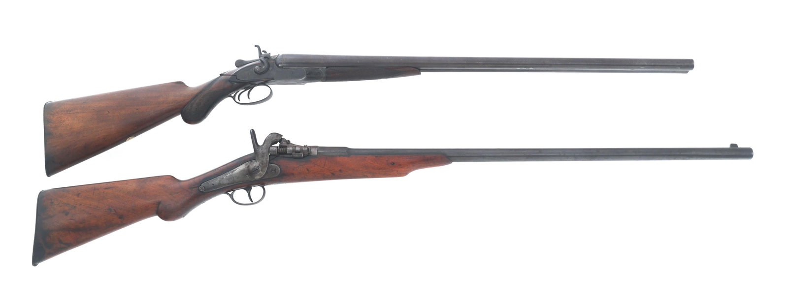 BELGIAN ZULU & W.M. GOODYER 12 GAUGE SHOTGUNS: BELGIAN ZULU & W.M. GOODYER 12 GAUGE SHOTGUNS Belgian conversion Zulu and W.M. Goodyer side by side 12 gauge shotguns. A) Faint Zulu stamped on top of breech. Belgian proof marks on left breech. Metal