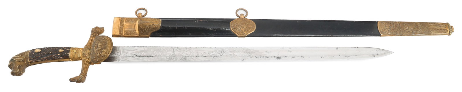 GERMAN HOUND HEAD HILT HUNTING ASSOCIATION CUTLASS: GERMAN HOUND HEAD HILT HUNTING ASSOCIATION CUTLASS German Hound Head Hunting Association Cutlass. Single edged, bright blade with fuller. Triple acid etched with floral and patriotic patterns.