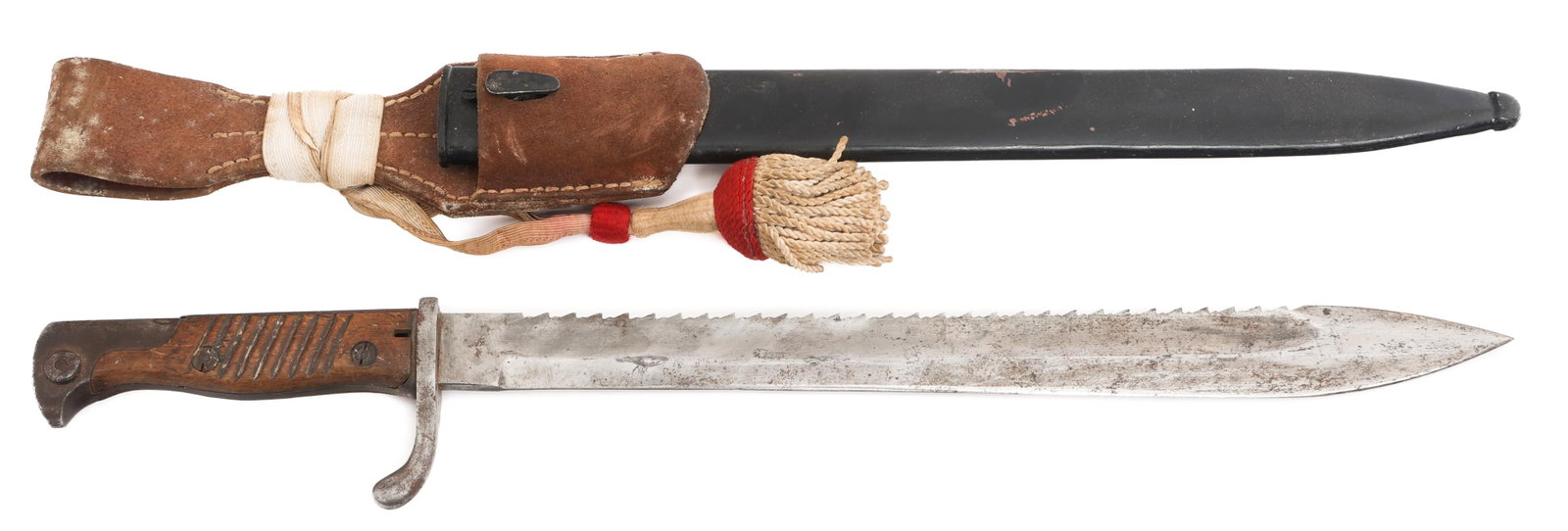 IMPERIAL GERMAN M1898/05 SAWBACK BUTCHER BAYONET: IMPERIAL GERMAN M1898/05 SAWBACK BUTCHER BAYONET Imperial German M1898/05 Sawback Butcher Bayonet. Single edged, sawback bright blade with fuller. Maker marked by WKC on the ricasso. Proof marks on