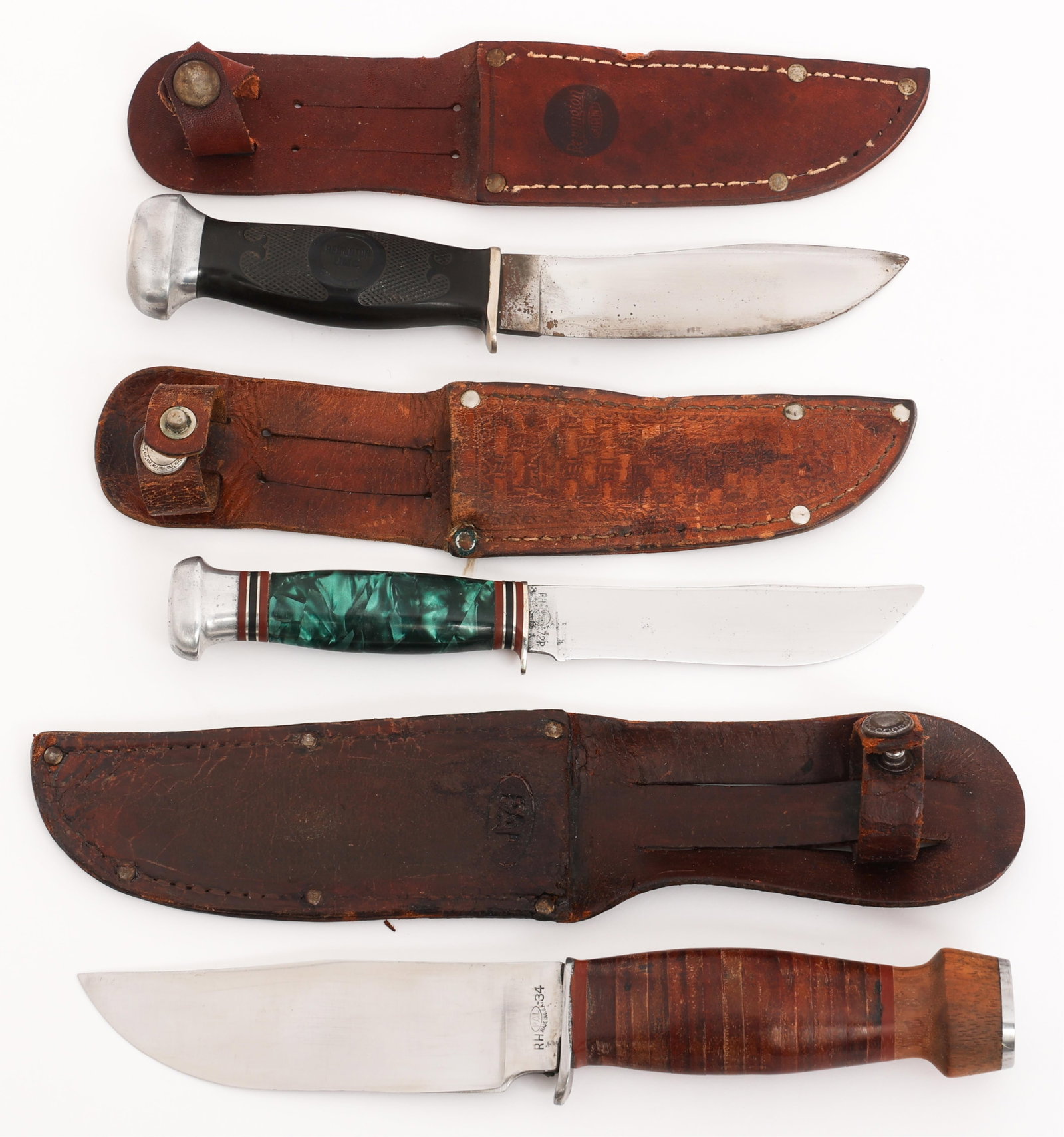 PAL RH34, REMINGTON RH 72P & DUPONT KNIVES: PAL RH34, REMINGTON RH 72P & DUPONT KNIVES Pal RH34, Remington RH 72P and DuPont Knives. (1) Pal RH34. Single edged blade. Maker marked by Pal on the ricasso. Steel hilt with stacked leather handle. W