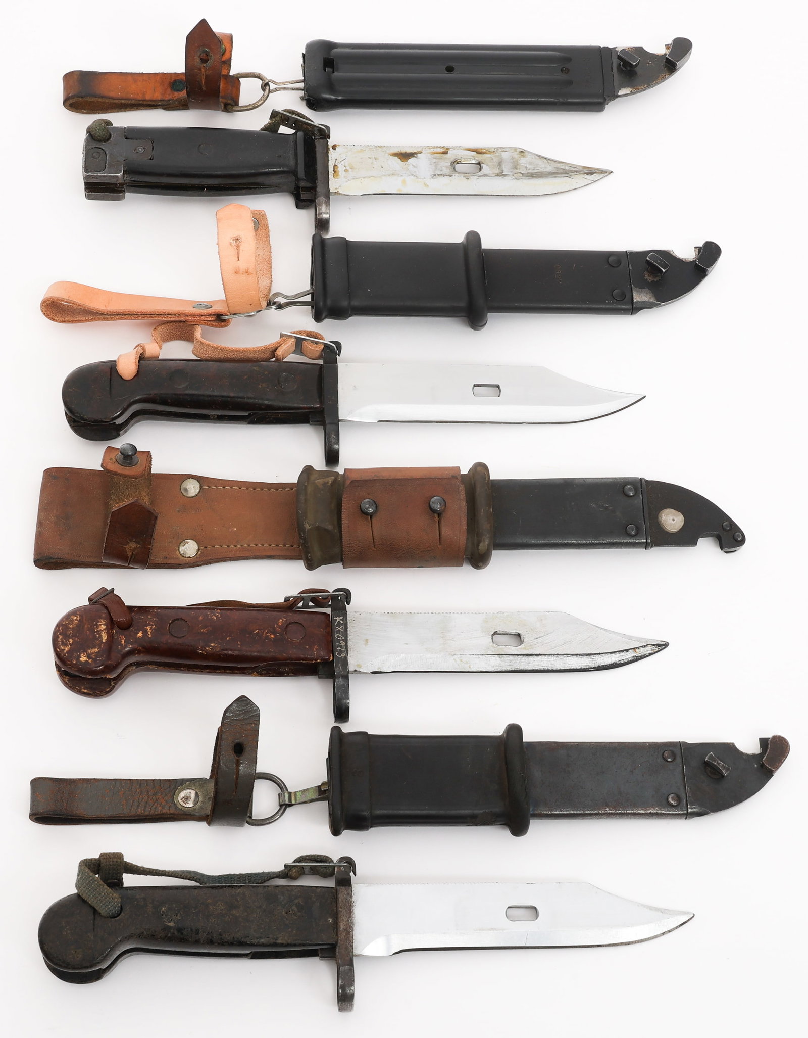 M1970 YUGO 6H4 & SOVIET AKM TYPE 1 BAYONETS: M1970 YUGO 6H4 & SOVIET AKM TYPE 1 BAYONETS Cold War M1970 Yugoslavian 6h4 and Soviet AKM Type 1 Bayonets. (1) Yugoslavian M1970. Single edged blade. Mismatched scabbard. (3) AKM Type 1. Single edged