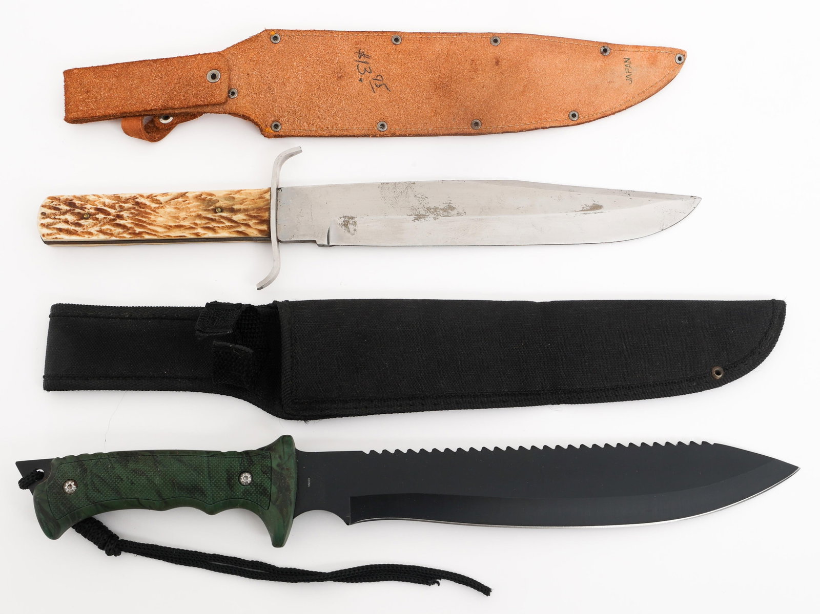 IDEAL PRODUCTS & TAC ASSAULT KNIVES: IDEAL PRODUCTS & TAC ASSAULT KNIVES (1) Ideal Products Bowie Knife. Single edged, bright blade. Maker marked by Ideal Products on the ricasso. Steel guard with stag horn grips. Leather sheath. (1)