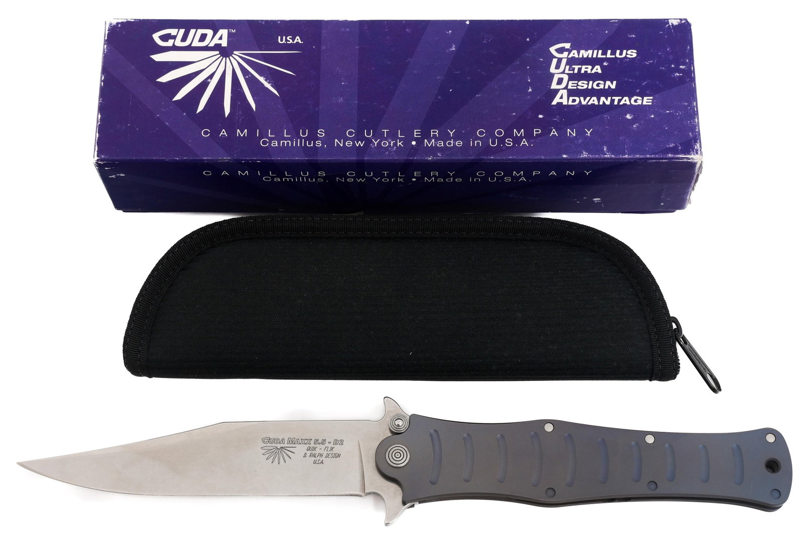 CAMILLUS CUDA MAXX DARREL RALPH DESIGN KNIFE: CAMILLUS CUDA MAXX DARREL RALPH DESIGN KNIFE Camillus Cuda Maxx Quik - Flik Folding Knife. Single edged, bright blade. Maker marked on the ricasso. Alloy based hilt. Includes cloth case and original