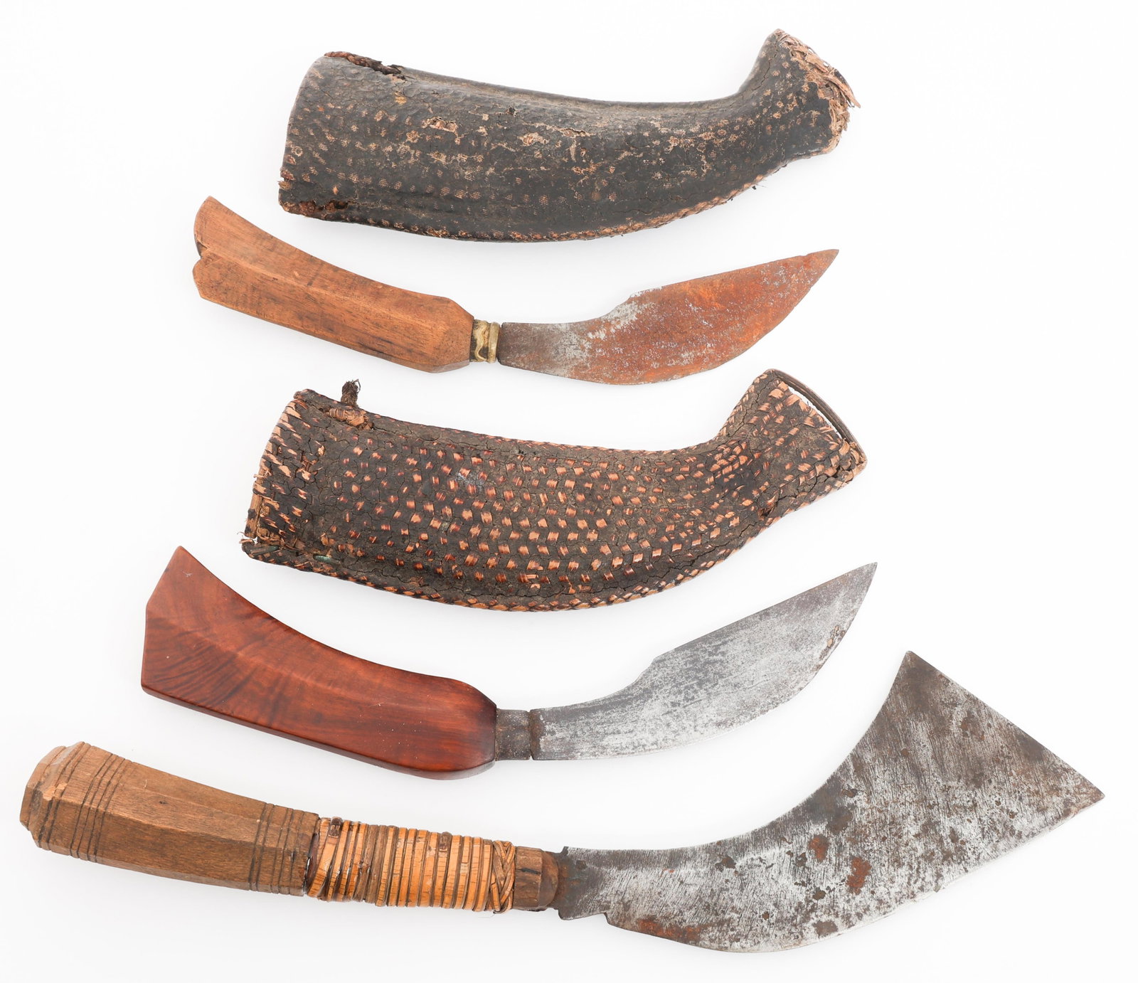 SOUTHEAST ASIAN PANABAS & KARAMBITS WITH SCABBARDS: SOUTHEAST ASIAN PANABAS & KARAMBITS WITH SCABBARDS Southeast Asian Panabas and Karambits. (1) Panabas. Single edged, square tip blade. Wooden and rattan wrapped handle. (2) Karambits. Single edged
