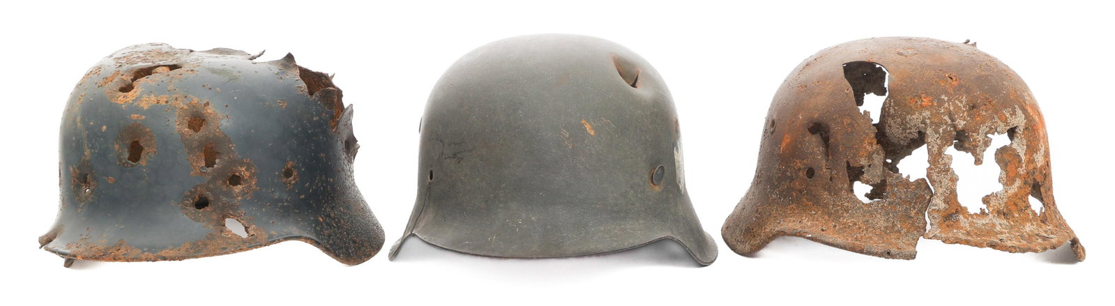 WWII GERMAN ARMY DUG COMBAT HELMET SHELLS: WWII GERMAN ARMY DUG COMBAT HELMET SHELLS WWII German Army Dug Relic Combat Helmet Shells. Includes M35 and two M40 helmets. No liners or chinstraps.