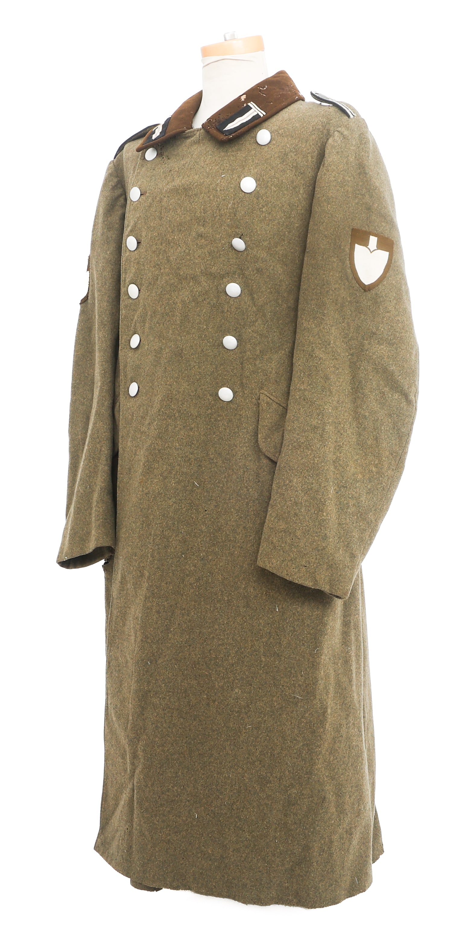 WWII GERMAN RAD HAUPTVORMANN OVERCOAT: WWII GERMAN RAD HAUPTVORMANN OVERCOAT WWII German RAD Hauptvormann Overcoat. Wool with RAD sleeve patch, Truppfuhrer shoulder boards and Hauptvormann collar tabs. Various stamps on the inside. Size: M