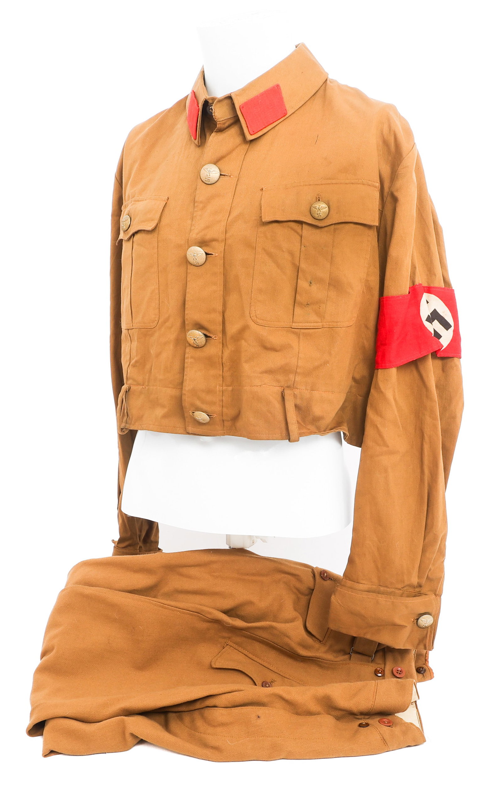 WWII GERMAN ENLISTED SA BROWNSHIRT UNIFORM: WWII GERMAN ENLISTED SA BROWNSHIRT UNIFORM WWII German Enlisted SA Brownshirt Uniform (1) Brown Cotton Shirt. NSDAP Armband and SA-Mann collar insignia. RZM tag. (1) Brown Cotton Breeches. RZM tag. Si