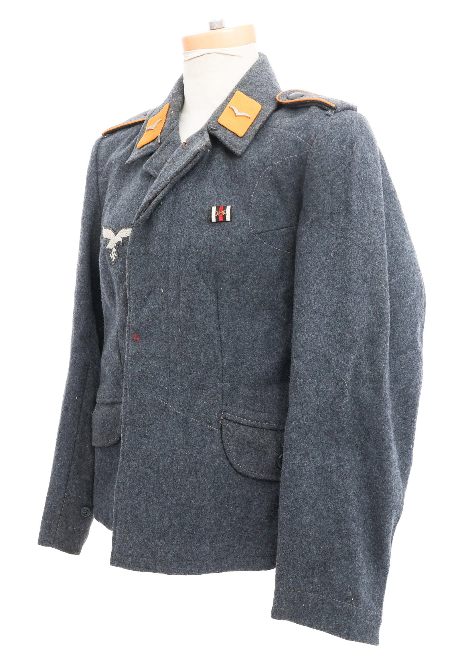 WWII GERMAN LUFTWAFFE ENLISTED FLIEGERBLUSE: WWII GERMAN LUFTWAFFE ENLISTED FLIEGERBLUSE WWII German Luftwaffe Enlisted Fliegerbluse. Dark-blue grey wool with enlisted shoulder tabs and Flieger collar insignia. Bullion stitched breast eagle and 