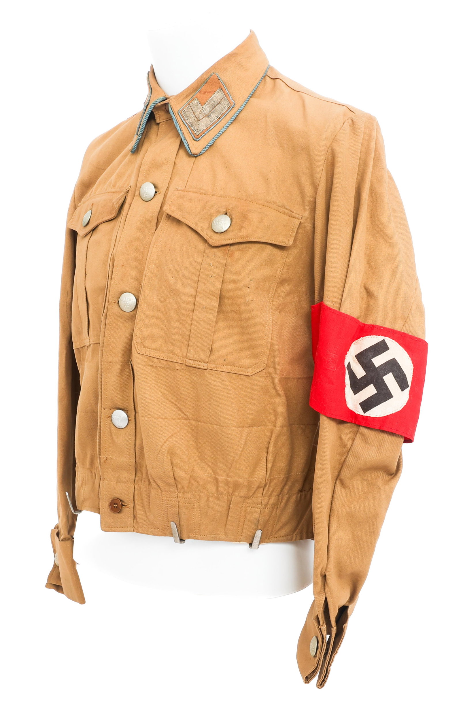 WWII GERMAN NSDAP HAUPTSTELLENLEITER BROWNSHIRT: WWII GERMAN NSDAP HAUPTSTELLENLEITER BROWNSHIRT WWII German NSDAP Ortsleitung Level Hauptstellenleiter Brownshirt. Brown cotton with NSDAP armband, light blue piping and Hauptstellenleiter Ortsleitung