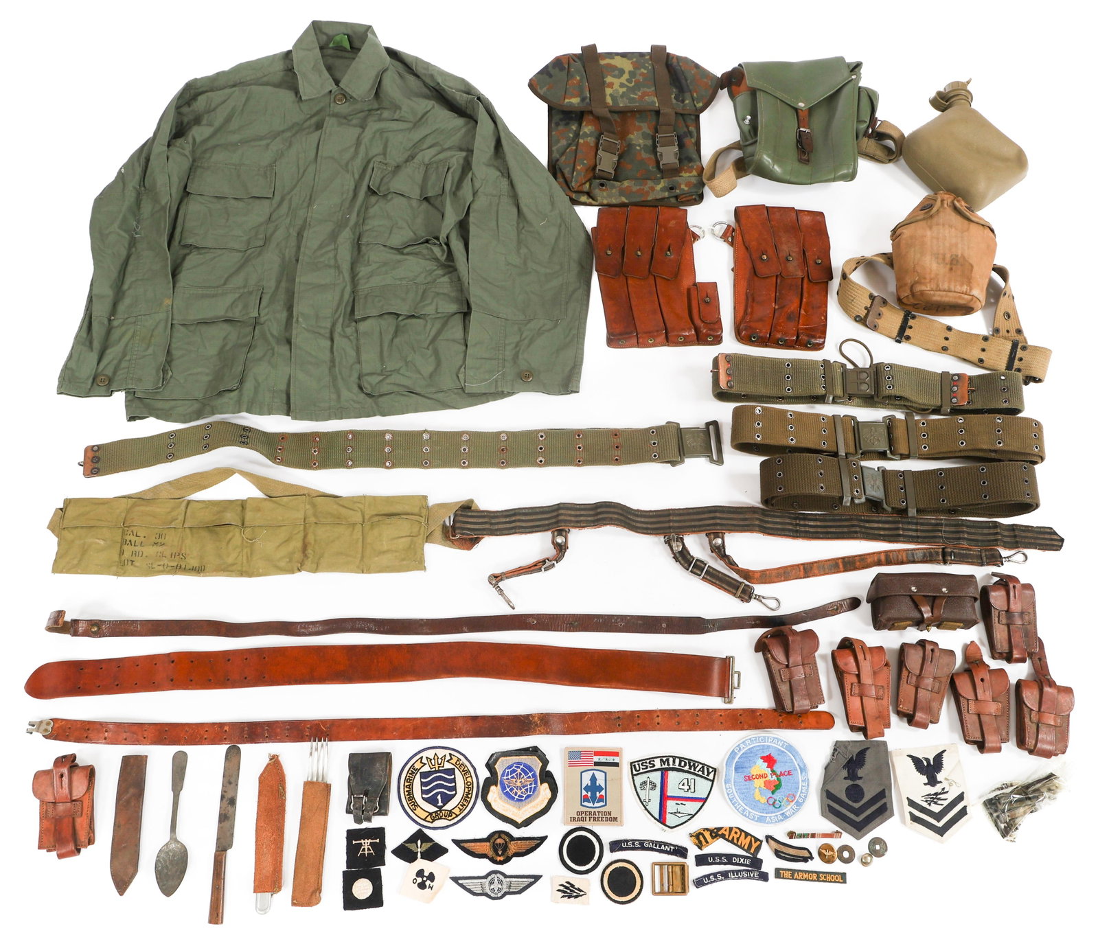 COLD WAR WORLD MILITARY FIELD GEAR BONANZA: COLD WAR WORLD MILITARY FIELD GEAR BONANZA Cold War World Military Field Gear and Patches Bonanza. Includes Bundeswehr flecktarn camouflaged haversack, Operation Iraqi Freedom patch, Military Airlift